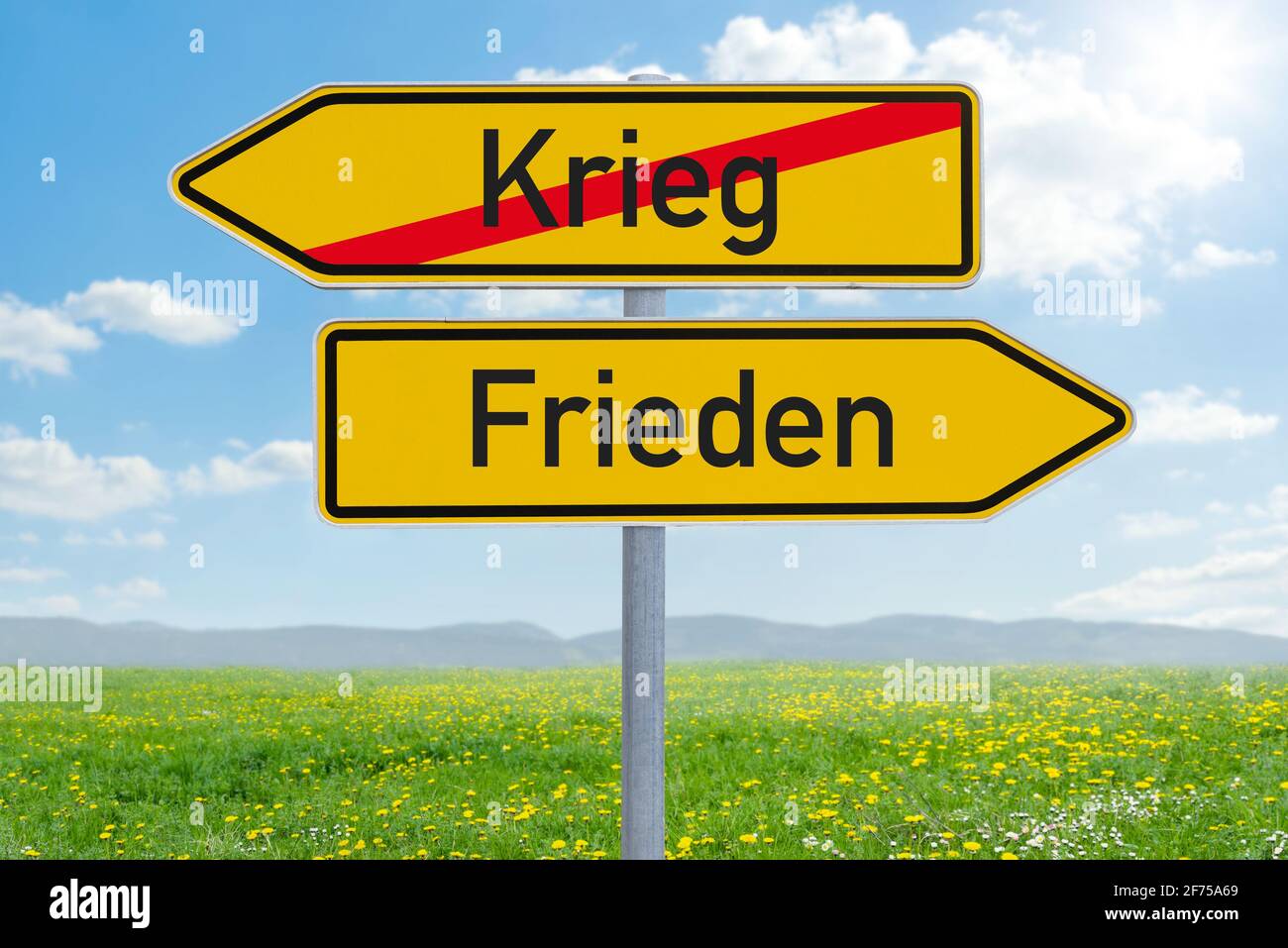 Two direction signs - War or Peace - Krieg oder Frieden (german Stock Photo  - Alamy