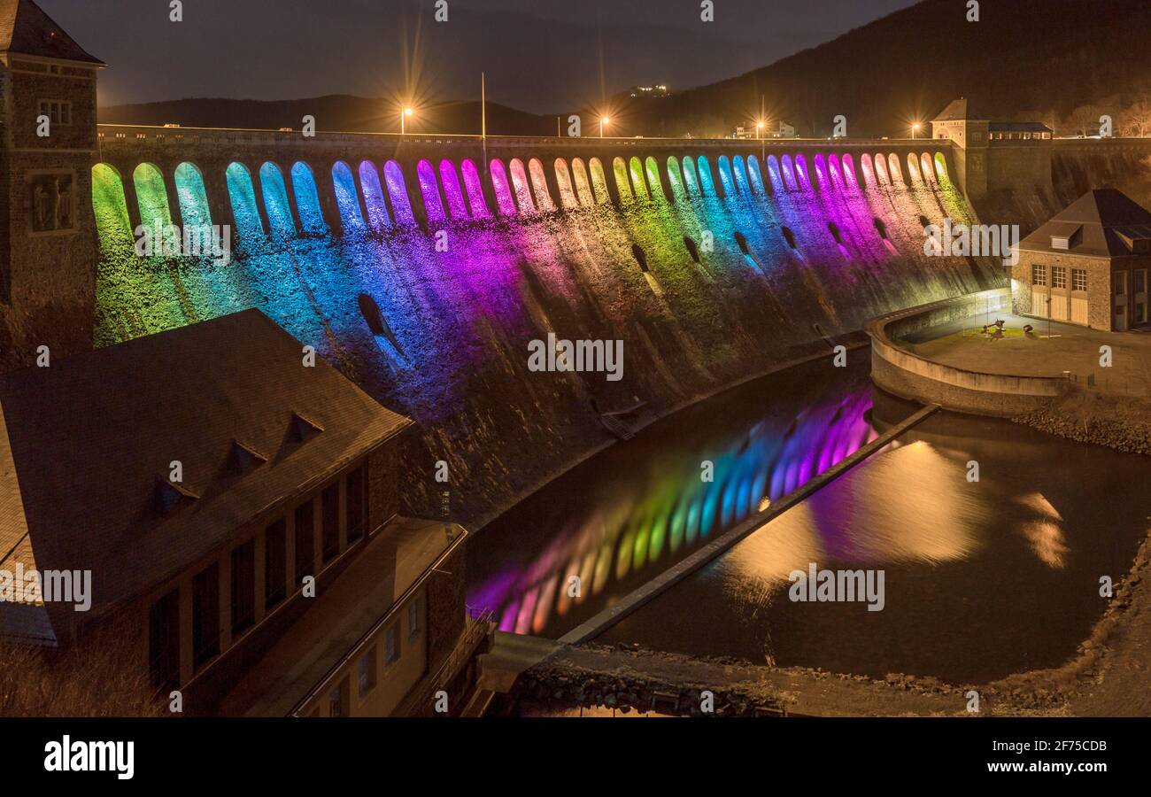 Colourful illuminated hydropower dam at the Edersee aka Edertalsperre Stock Photo
