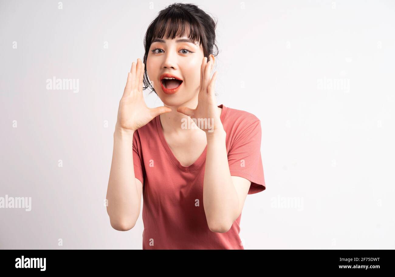 Young asian woman loud screaming hi-res stock photography and images ...