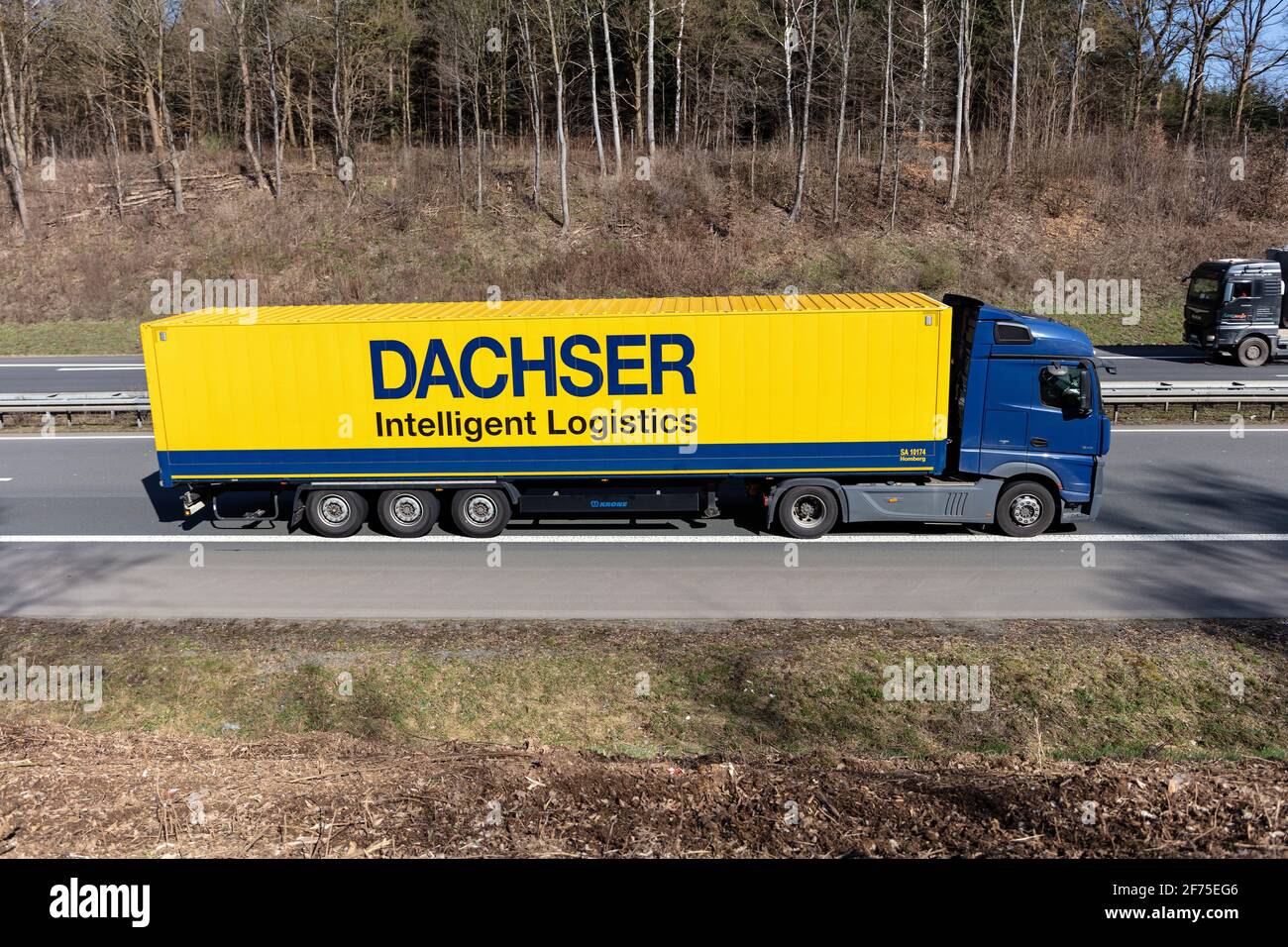 Dachser Mercedes-Benz Actros truck with box trailer on motorway. Stock Photo