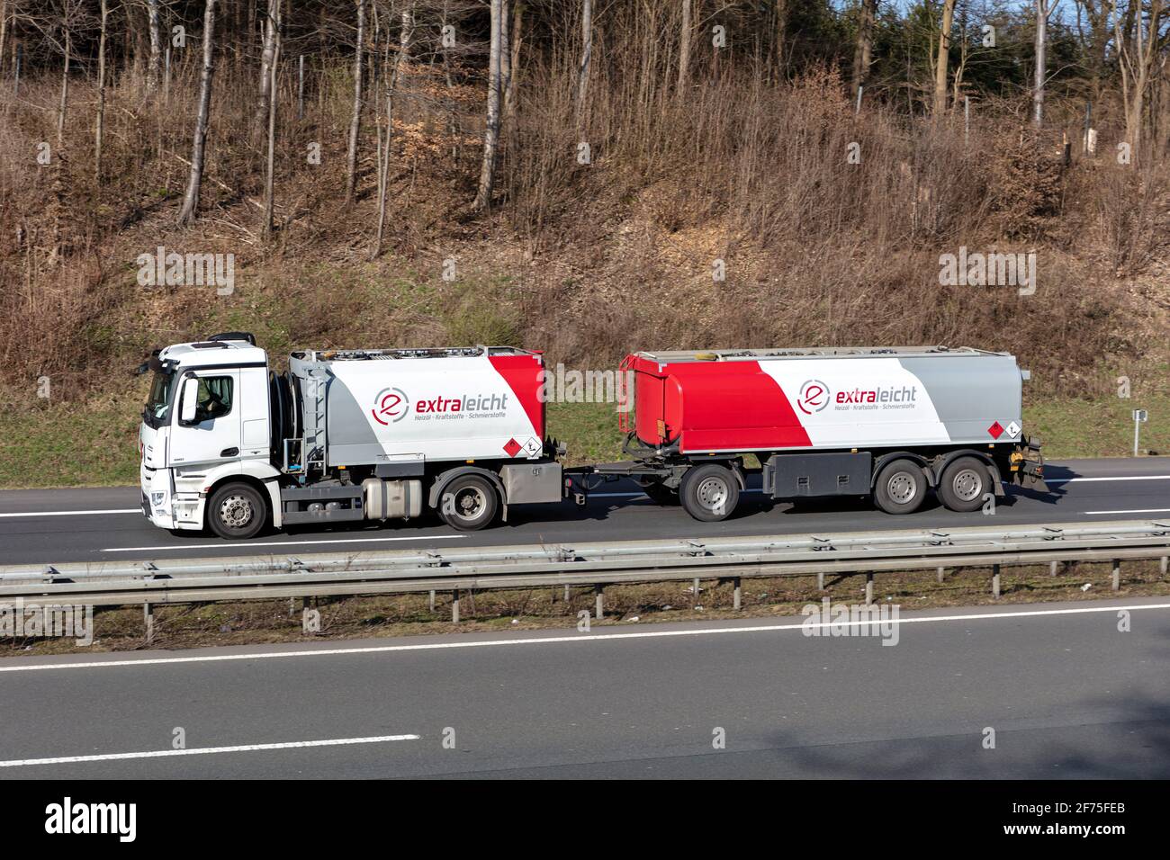extraleicht Mercedes-Benz Antos tank combination truck on motorway. Stock Photo