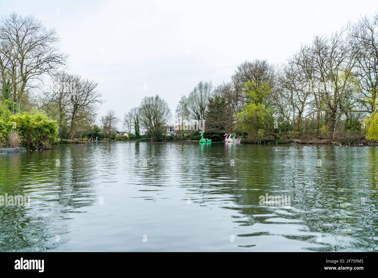 LONDON, UK - MARCH 31 2021: View of boating lake with pedal boats on at Alexandra Palace in London Stock Photo