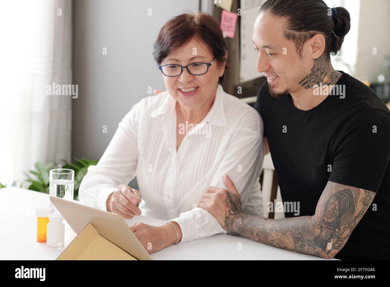 Mature mother and son doctor hi-res stock photography and images - Alamy
