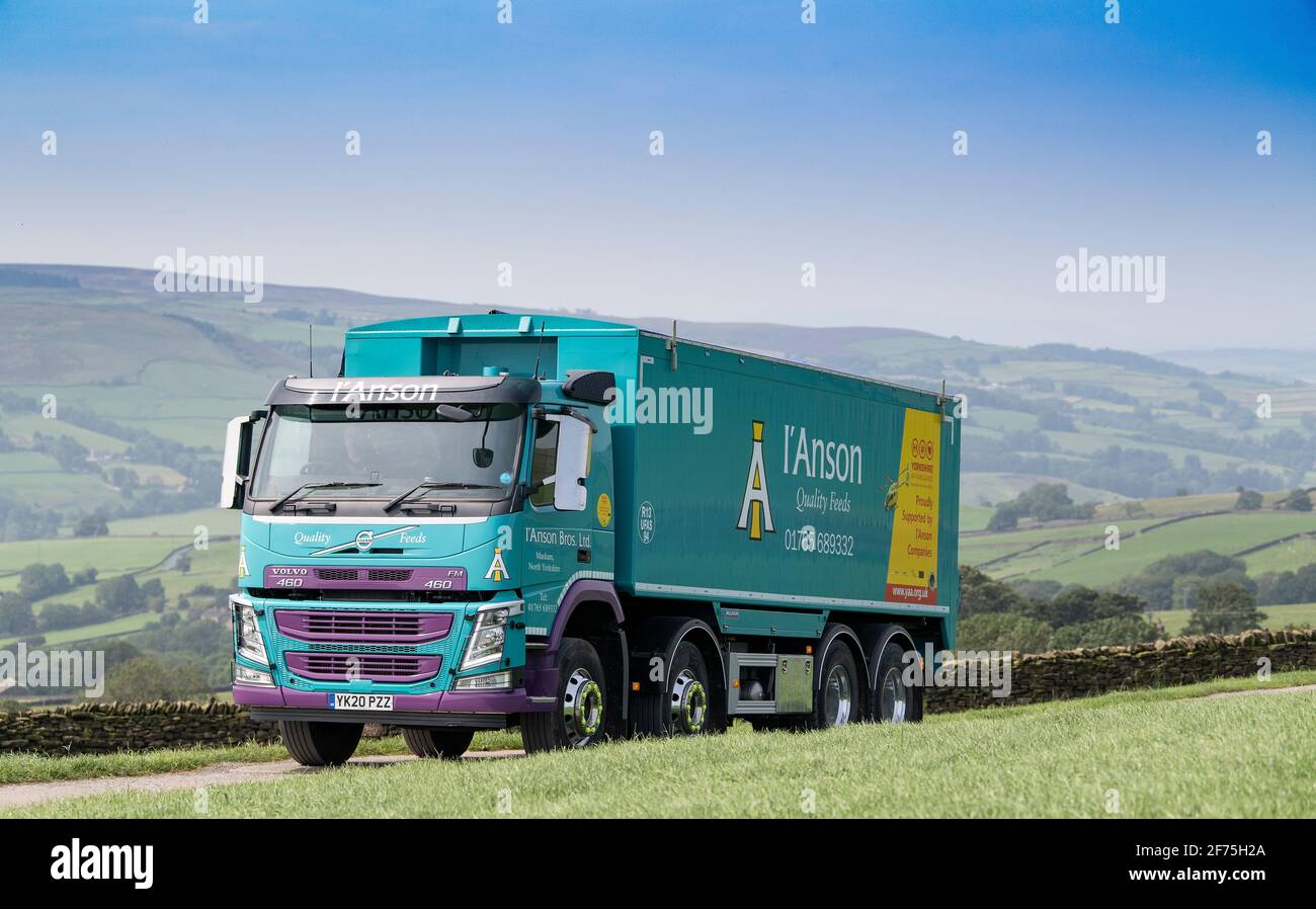 Lorry delivering a bulk load of animal feed to a dairy farm in North Yorkshire, UK. Stock Photo