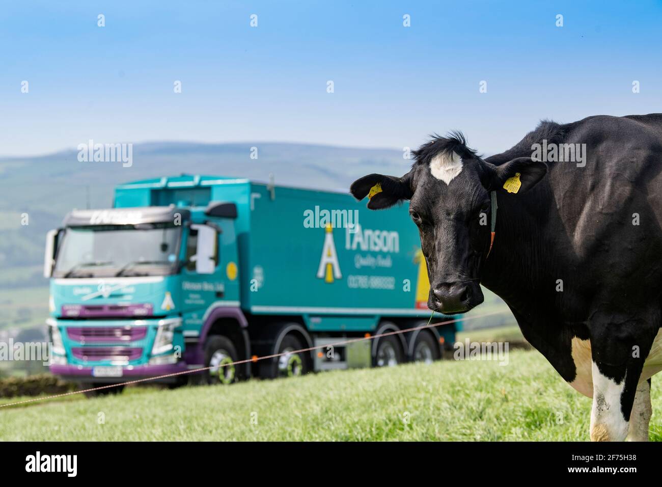 Lorry delivering a bulk load of animal feed to a dairy farm in North Yorkshire, UK. Stock Photo