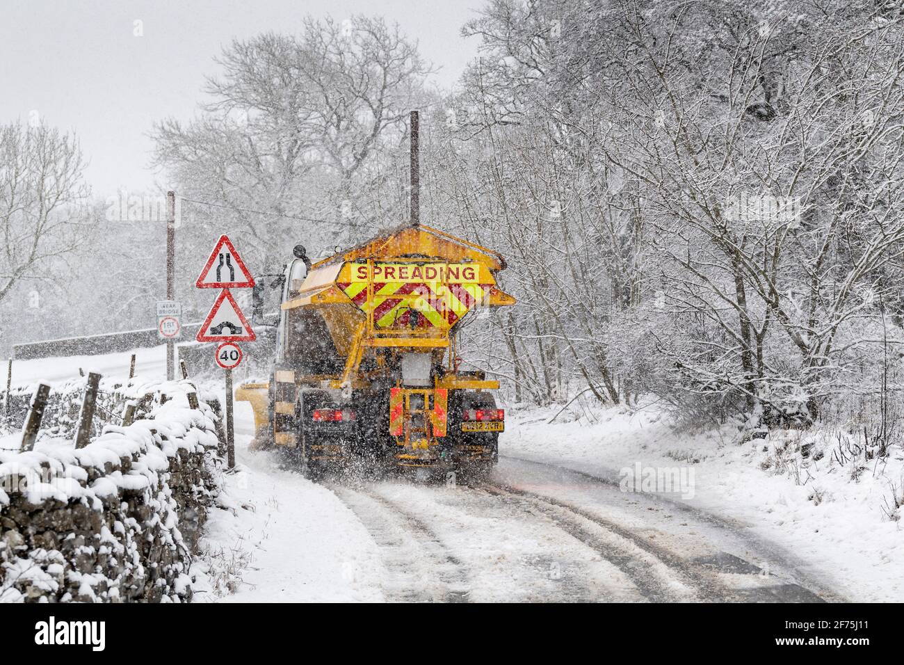 Council wagon gritting the A684 near Hawes after snowstorm, Hawes, North Yorkshire, Stock Photo