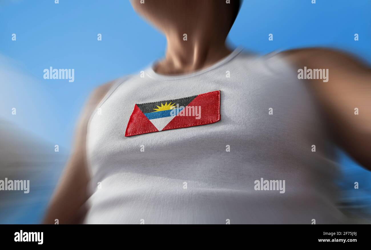 The national flag of Antigua and Barbuda on the athlete's chest Stock Photo