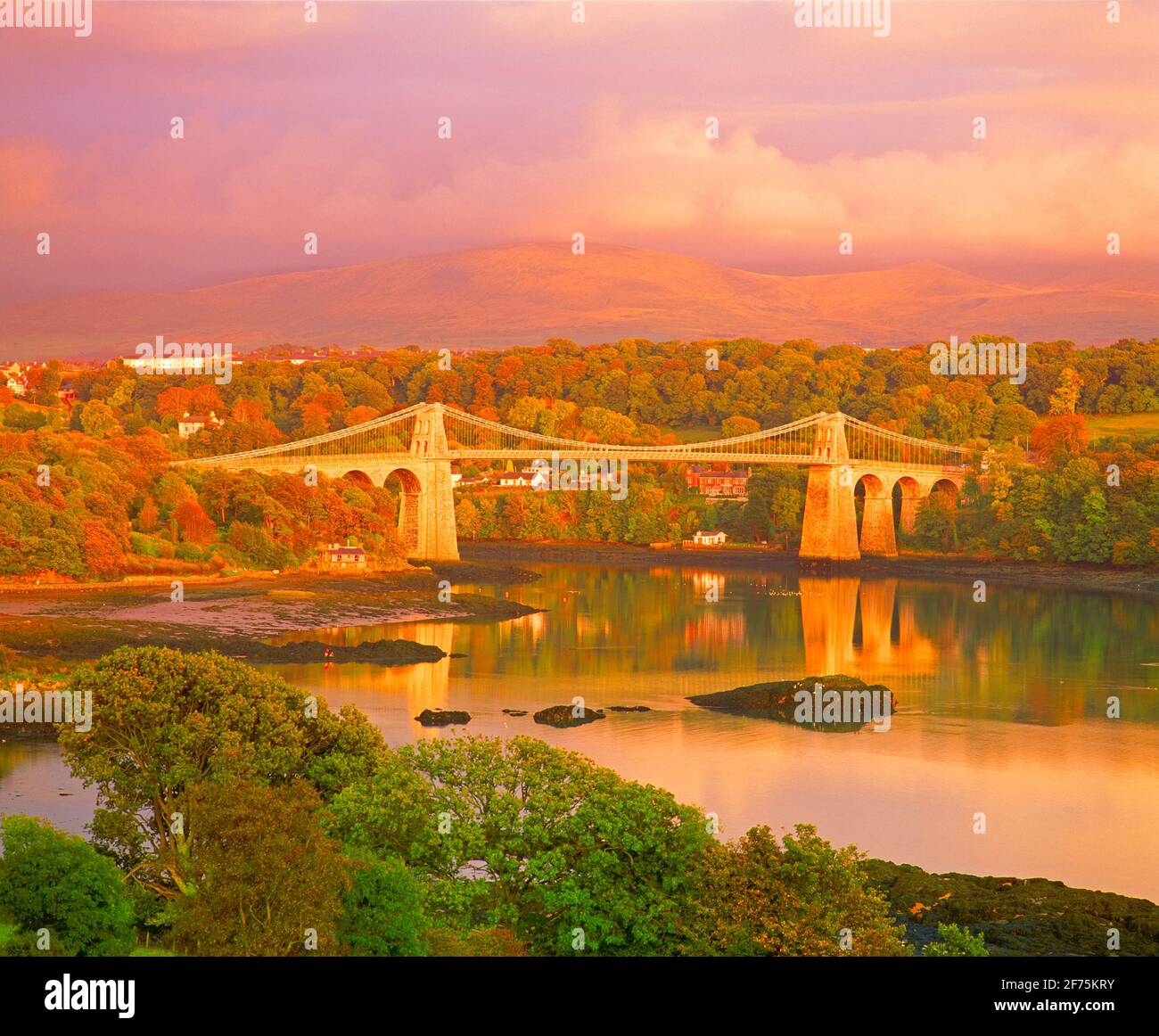 UK, Wales, Menai Bridge over Menai Strait, autumn, sunset, Stock Photo