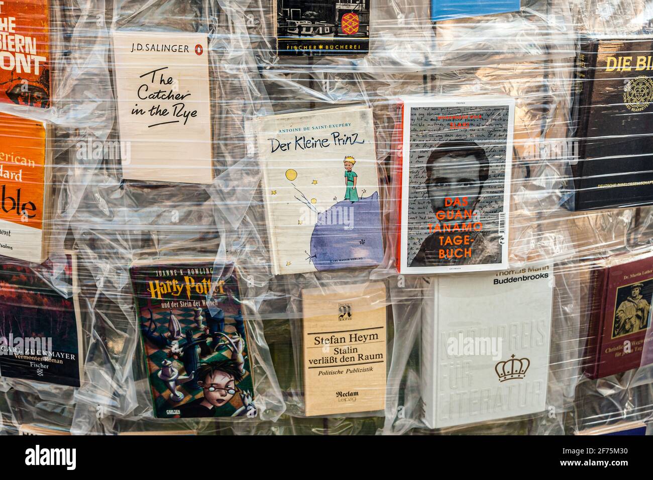 Books in plastic jackets. In the meantime, almost all pillars are equipped with books. At the end of the Documenta, the Parthenon will be dismantled - books will be given away to visitors and the plastic will be recycled Stock Photo