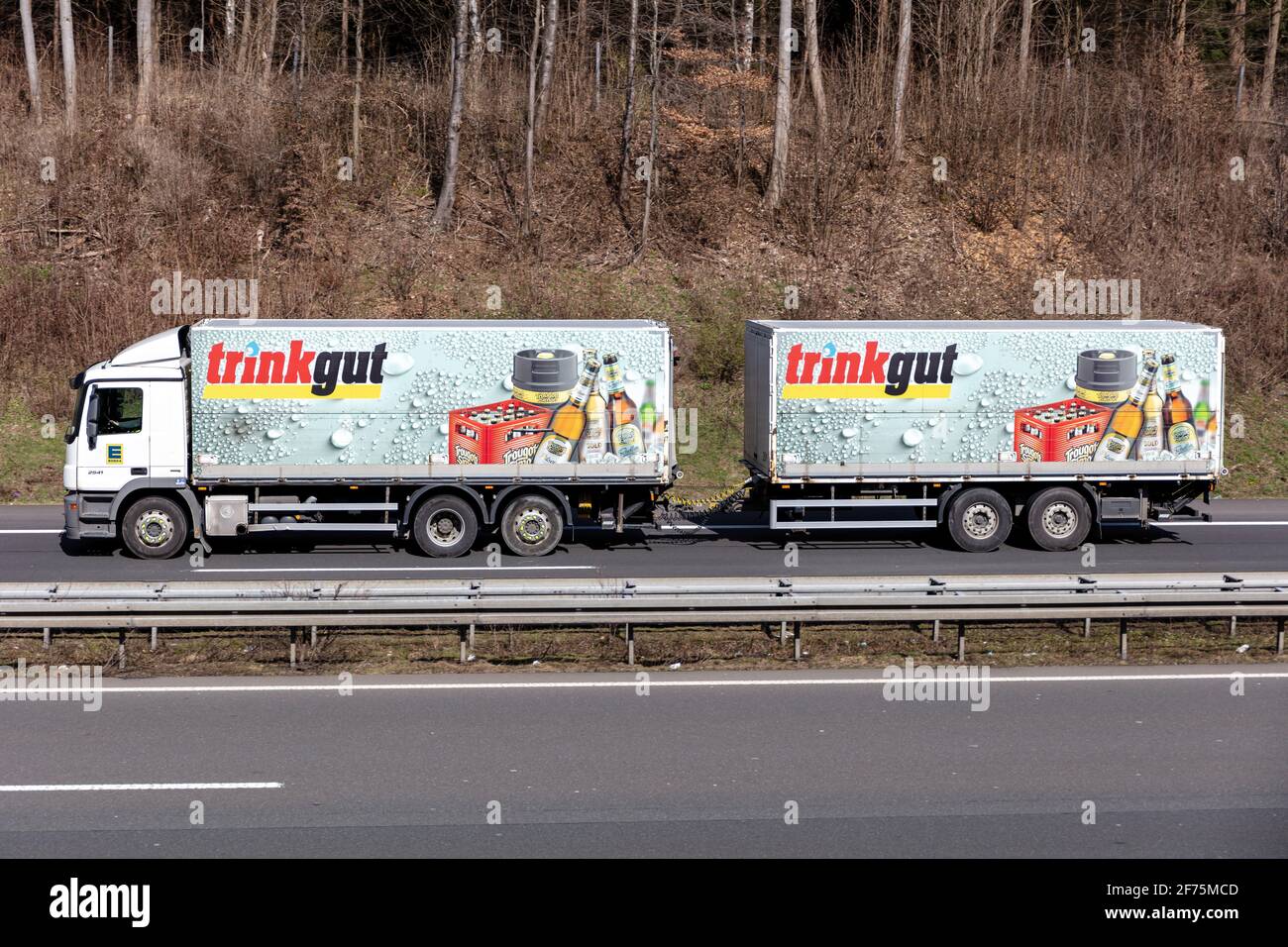 trinkgut MercedesBenz beverage truck on motorway Stock Photo Alamy