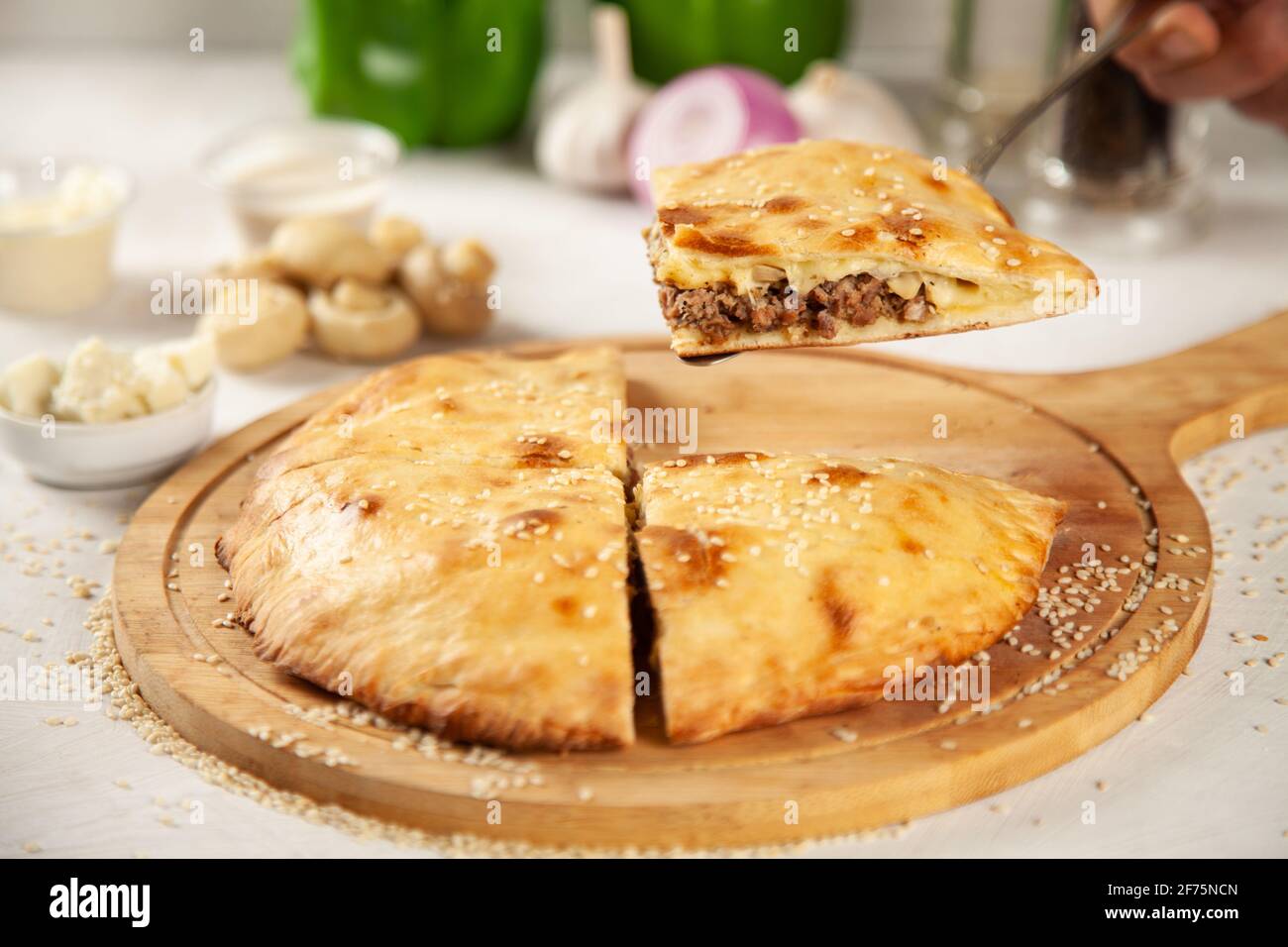 Beef cheese mushroom stuffed naan Stock Photo Alamy