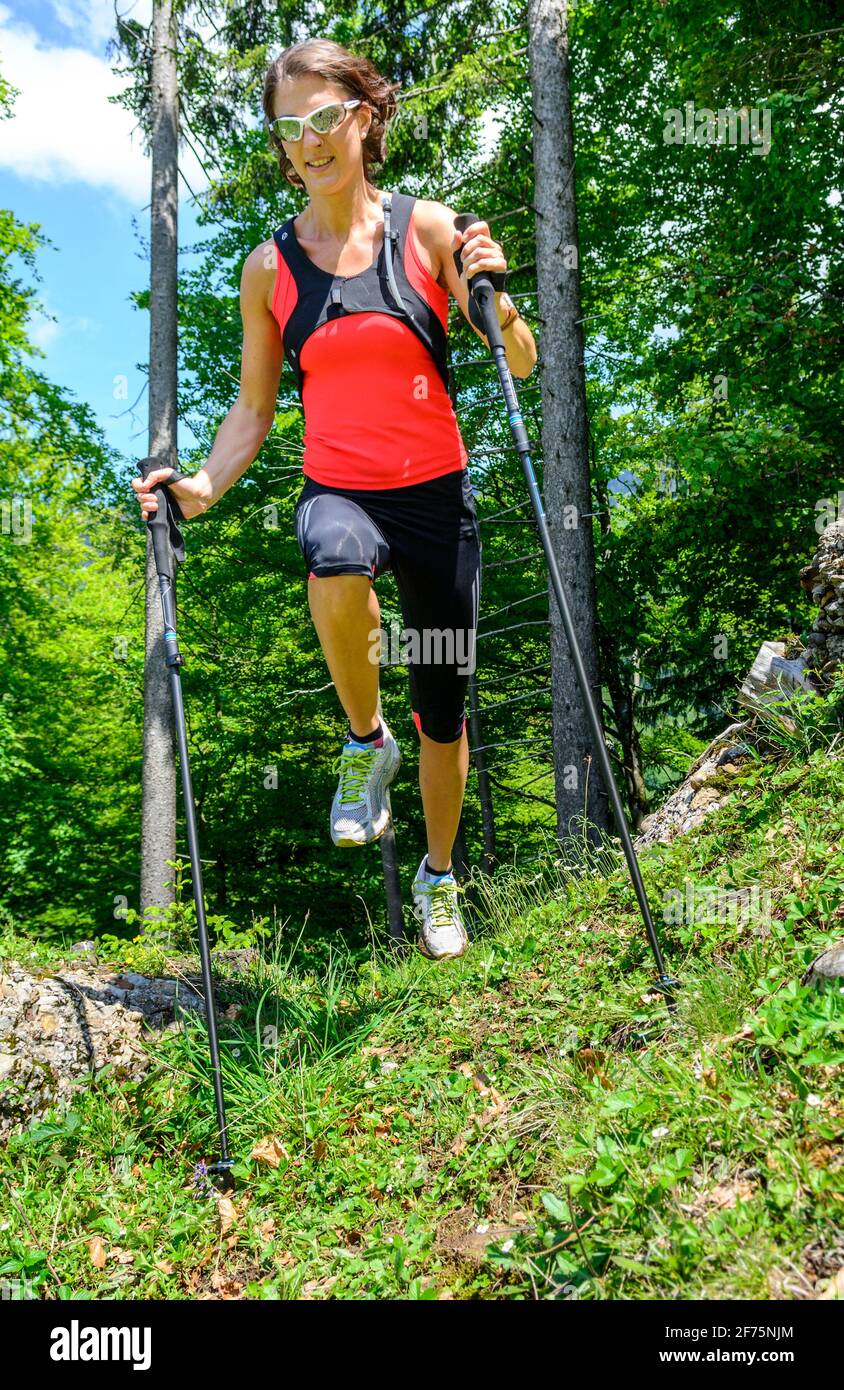 Arduous trail running exercise in alpine region Stock Photo