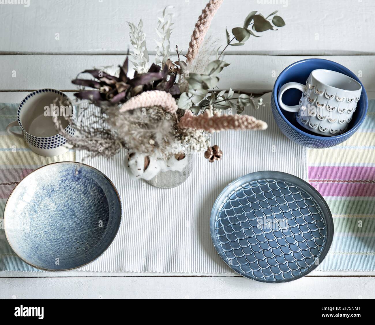 Close up of home set of modern ceramic tableware with creative design ...