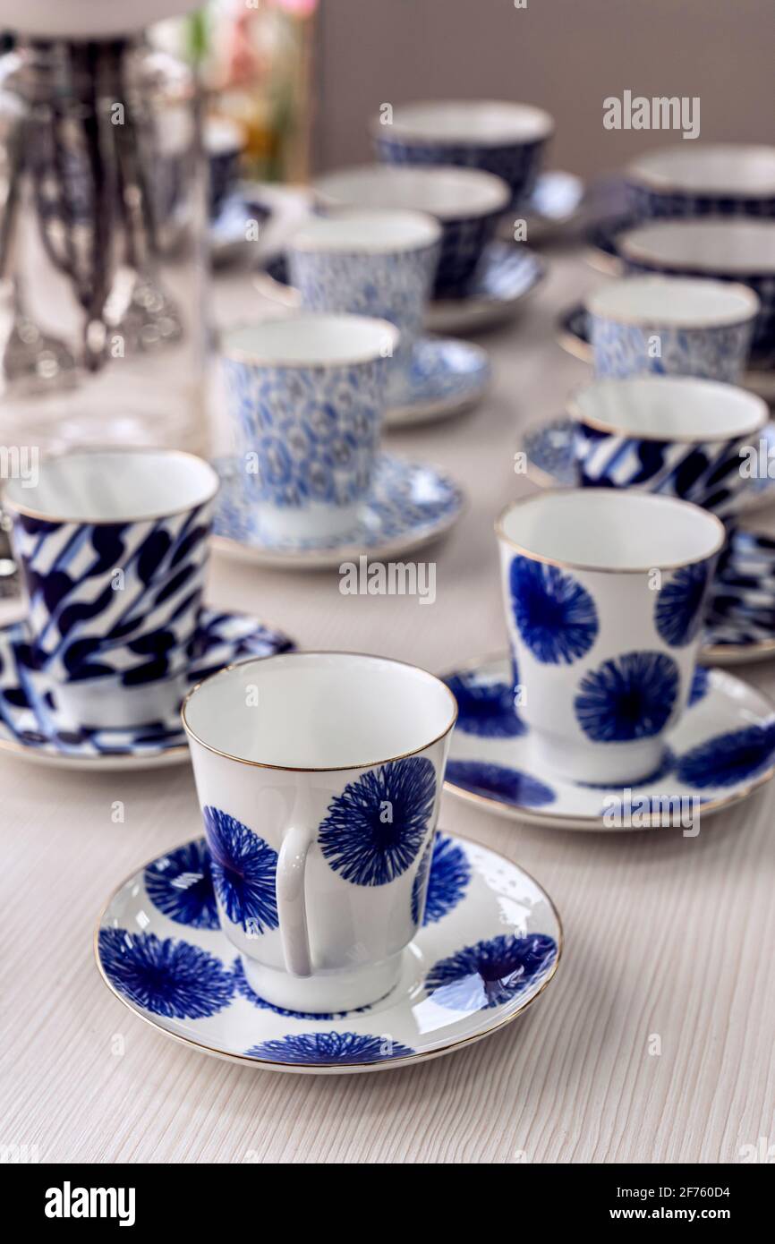 set of blue tea mugs with blue pattern Stock Photo - Alamy