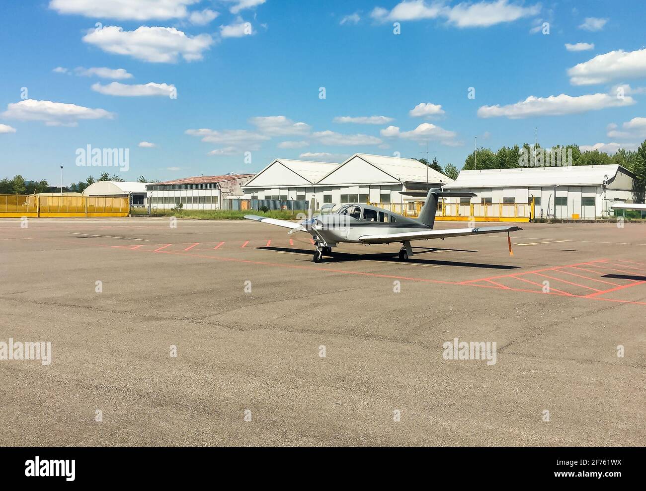 Small private Piper PA 28 Aircraft parked at the small Venegono airport, province of Varese, Italy Stock Photo