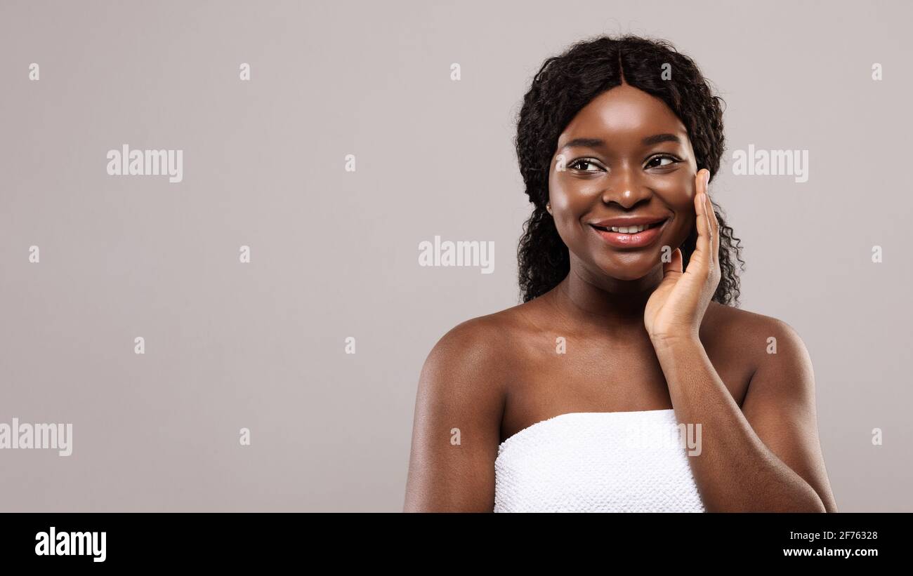 Skincare Concept. Beautiful Black Woman Touching Her Smooth Skin And ...