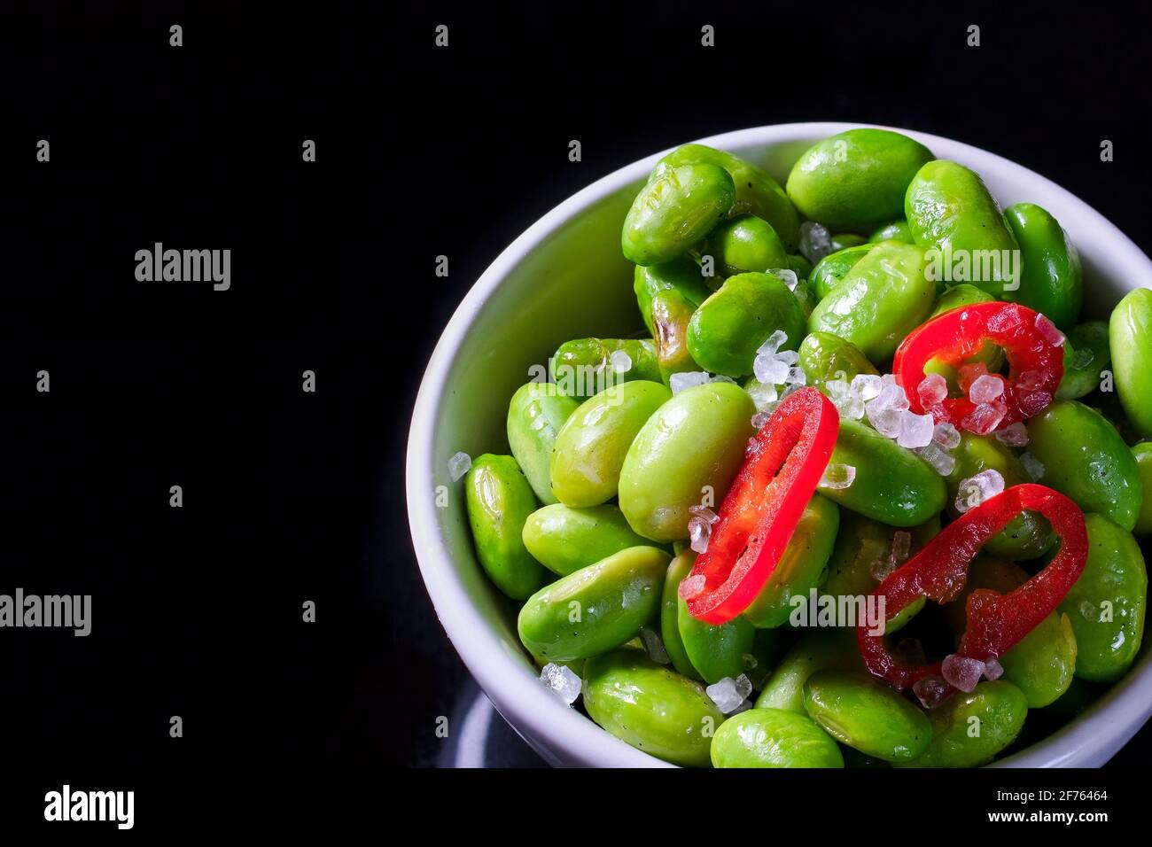 Pan fried Edamame Beans with red chilli and rock salt Stock Photo Alamy