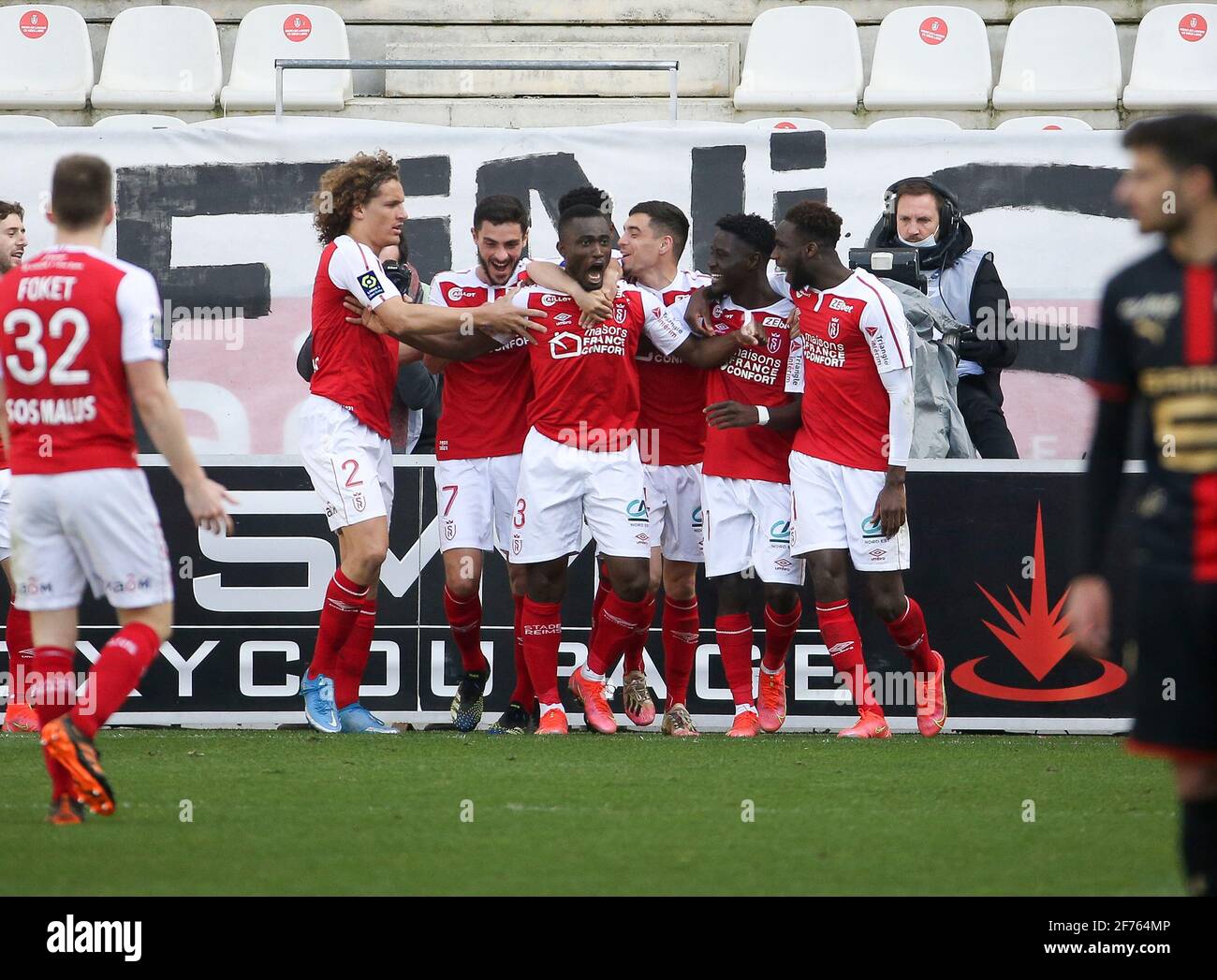 Ghislain Konan of Reims celebrates his goal with teammates during the  French championship Ligue 1 football match between Stade de Reims and Stade  Rennais (Rennes) on April 4, 2021 at Stade Auguste