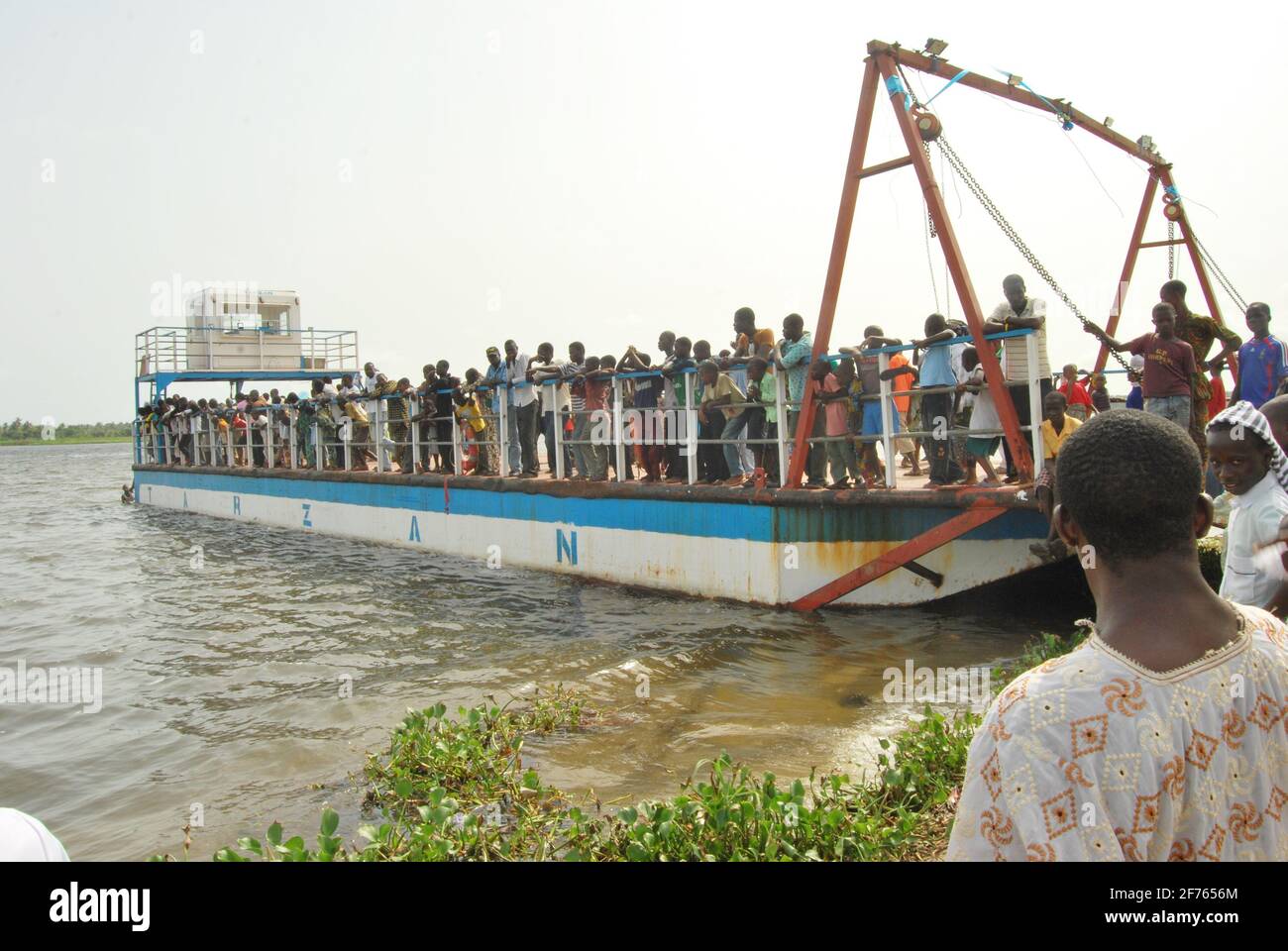 People watching an arc used during slave trade in Badagry, Lagos, Nigeria. Stock Photo