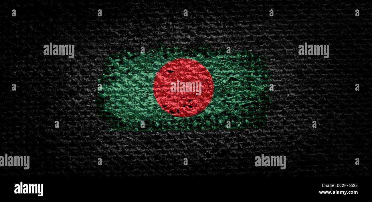 National flag of the Bangladesh on dark fabric Stock Photo