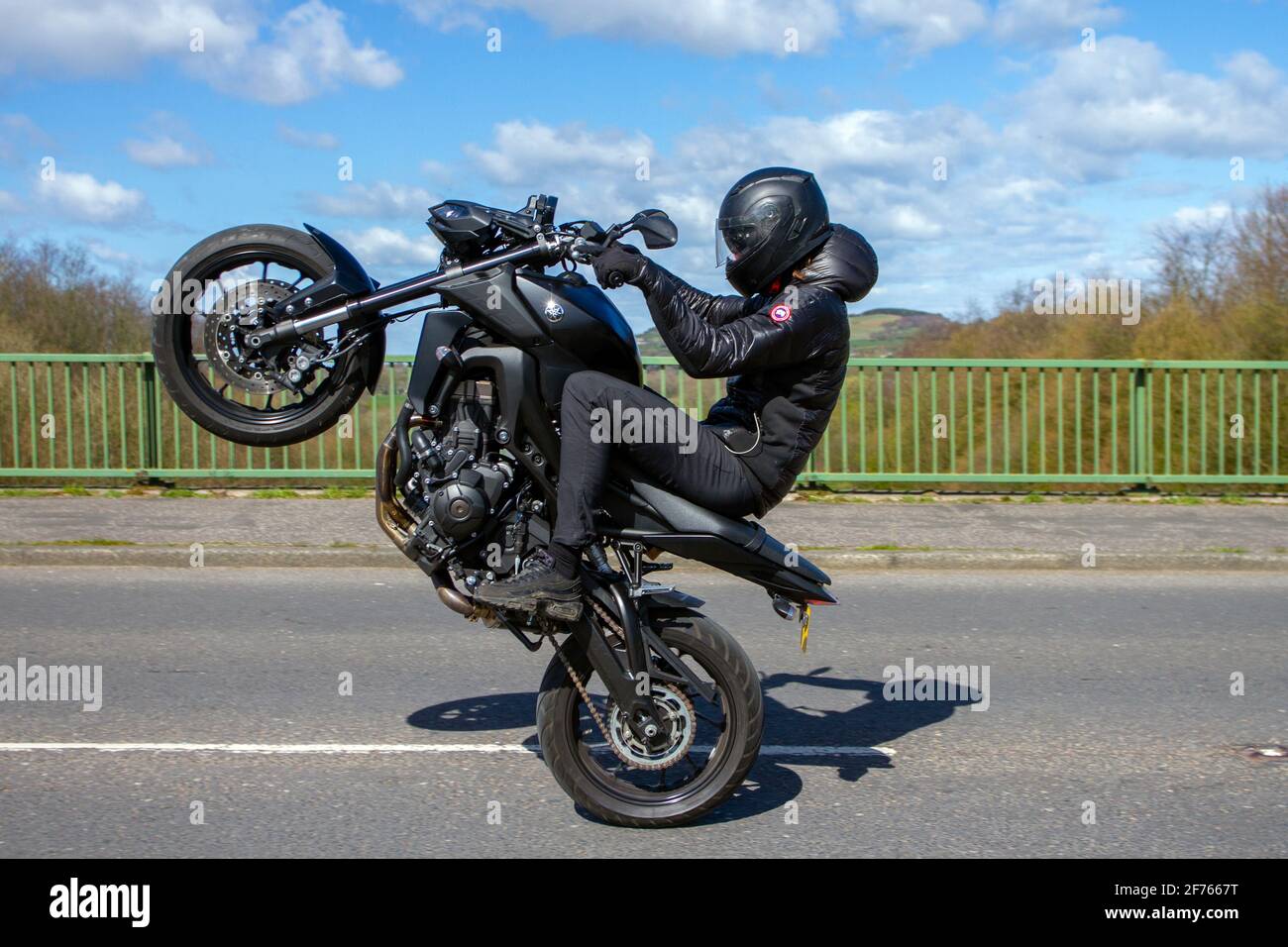 Motorcycle trick hi-res stock photography and images - Alamy