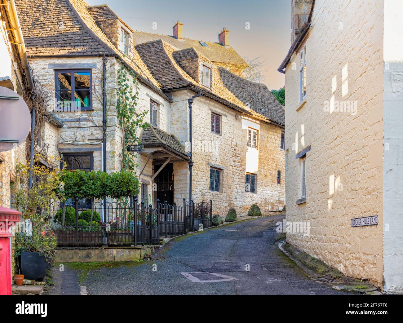 Narrow lane in Nailsworth Town in the Cotswolds, Gloucestershire, United Kingdom Stock Photo