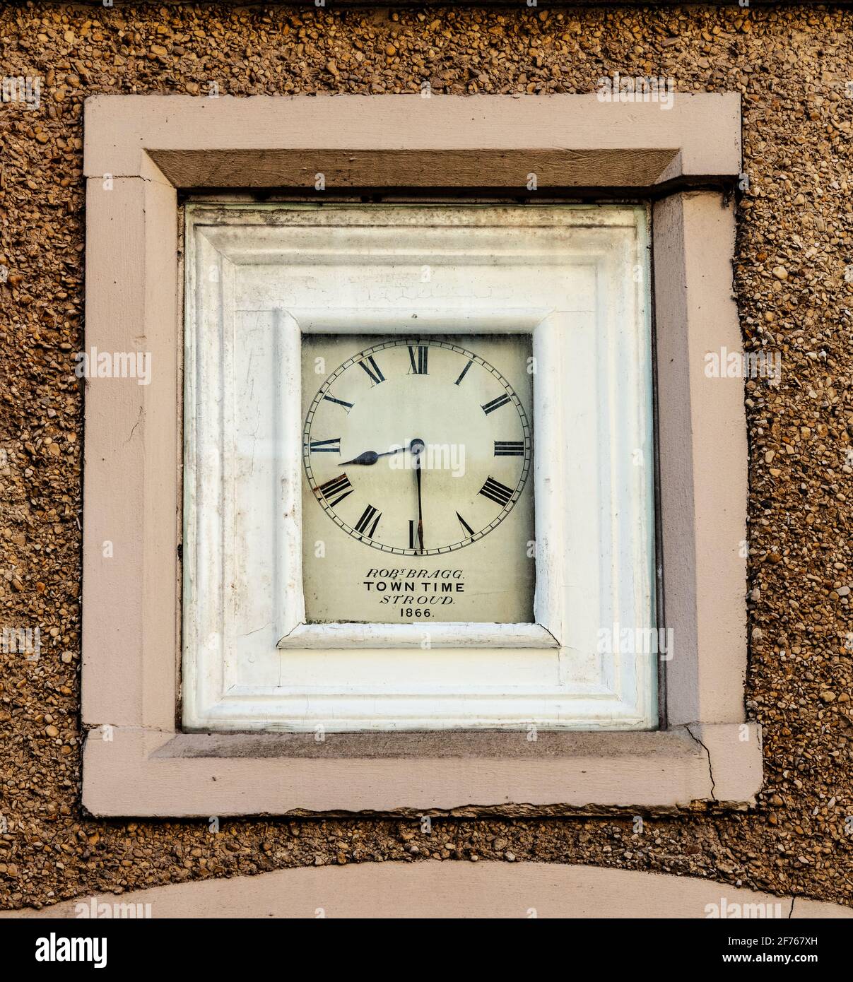 Stroud Time clock referring to the time when Stroud time was 9 minutes behind GMT until the railways arrived, Nailsworth, The Cotswolds, England Stock Photo
