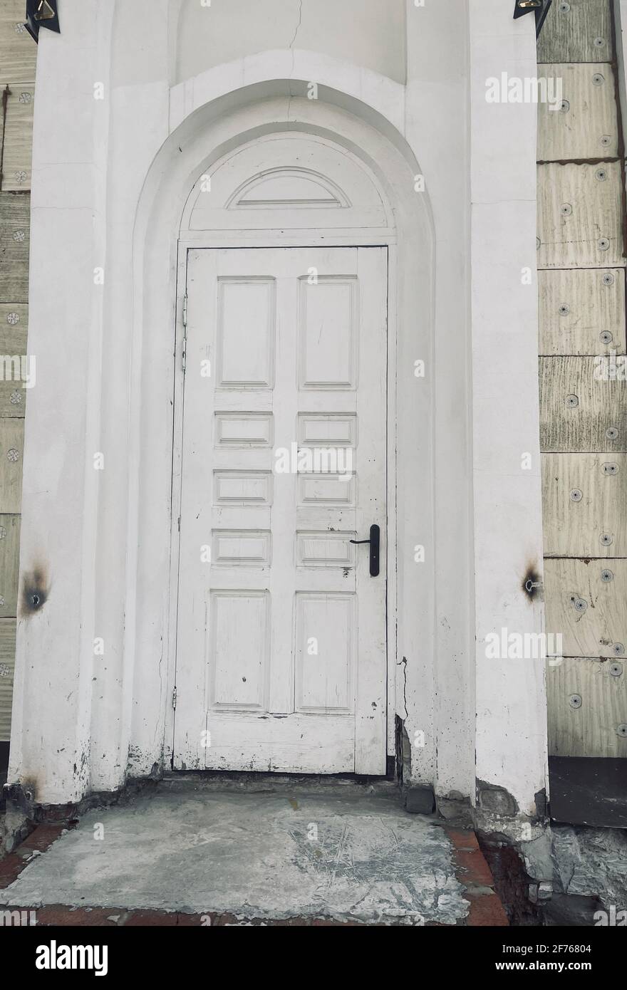 Old decayed white wooden closed door exterior Stock Photo Alamy