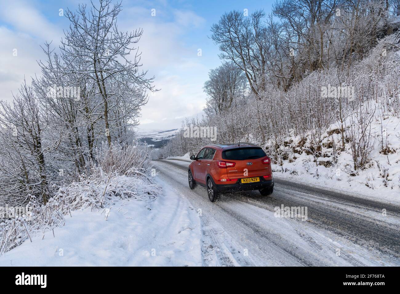 Weather UK 6 January 2021, Redmire, Wensleydale, UK. Snow made travel hard work on Scarr Top above Redmire in Wensleydale, as fresh snow and sub zero Stock Photo