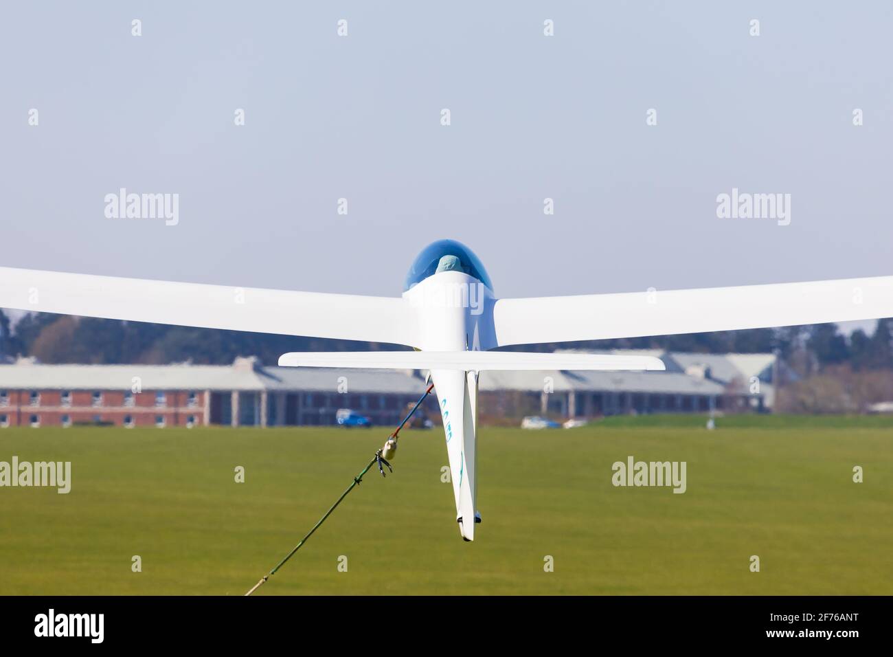 Alexander Schleicher ASW24 glider being launched by wire. Stock Photo