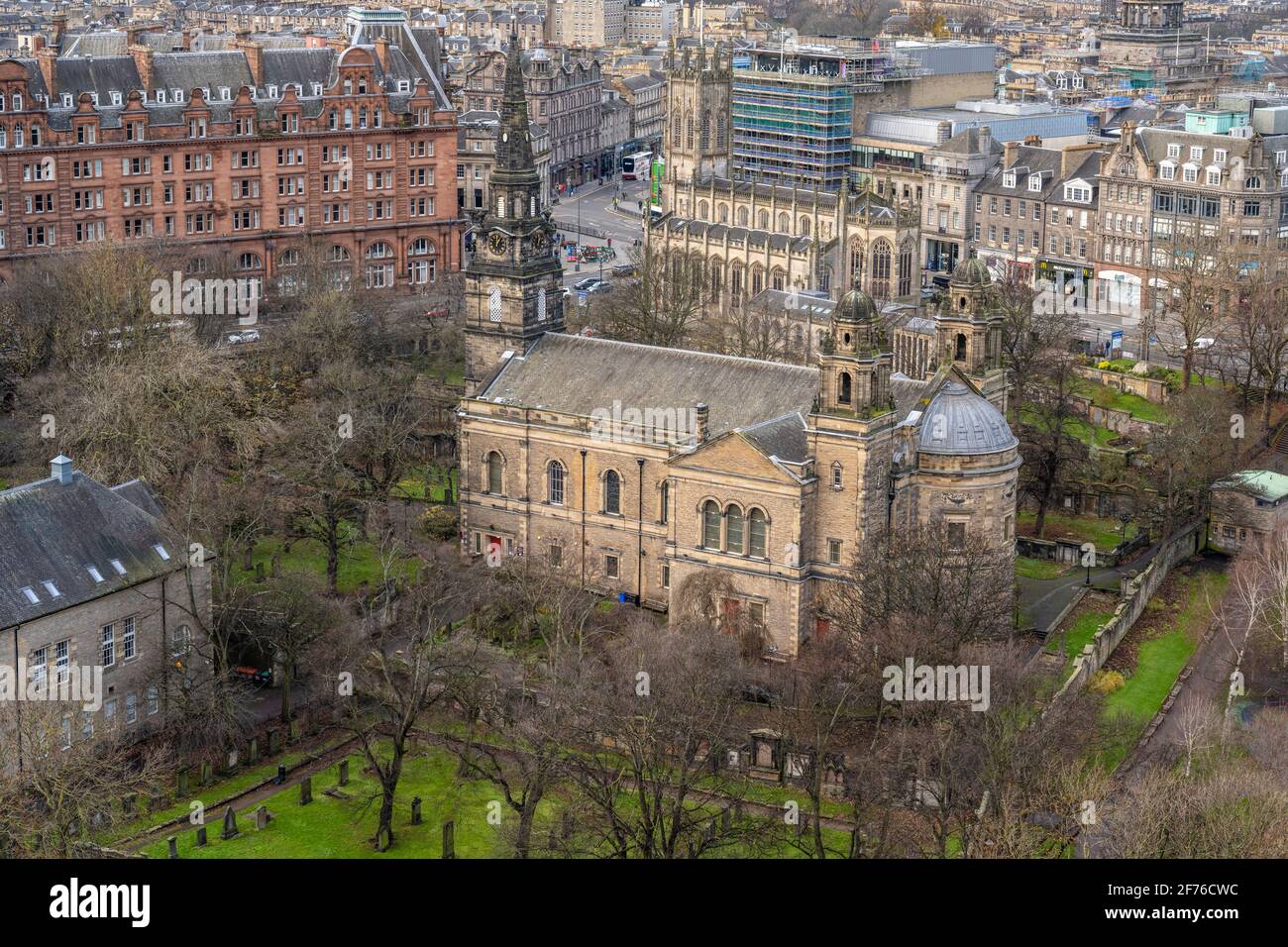 Elevated view of the Parish Church of St Cuthbert and the Waldorf Astoria Hotel from Edinburgh Castle battlements - Edinburgh, Scotland, UK Stock Photo
