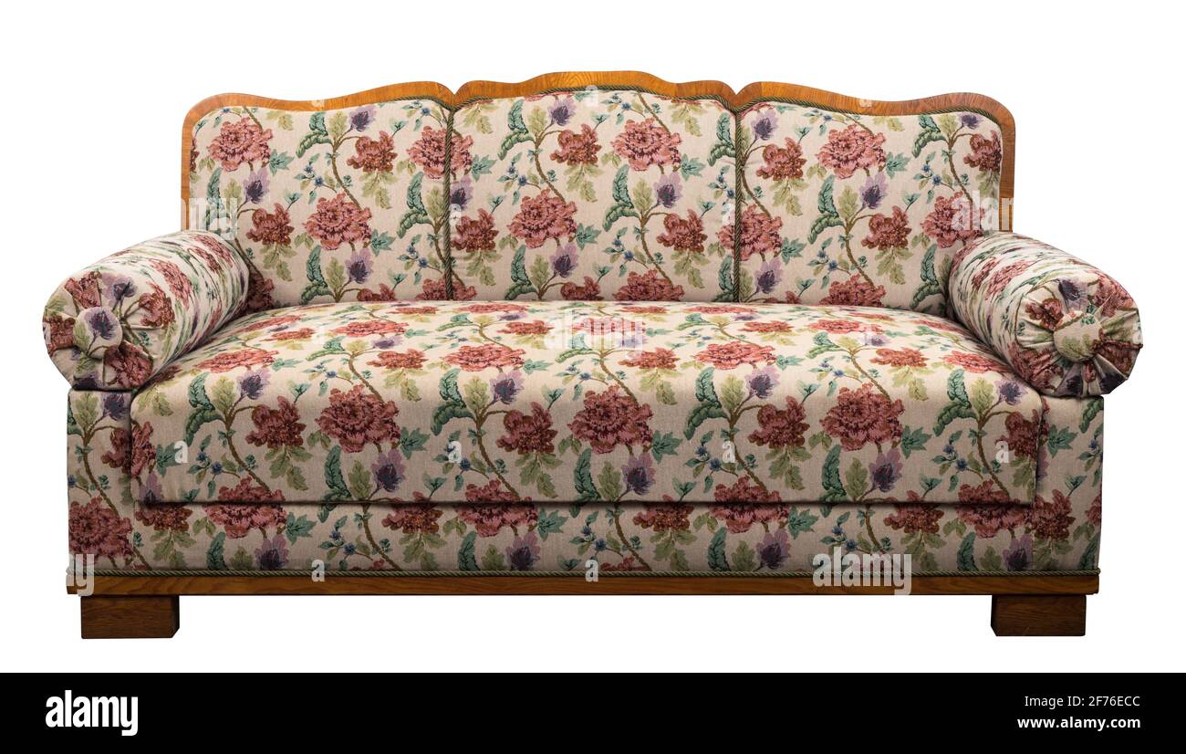 Fabric armchair sofa in a slightly primitive style. Stock Photo