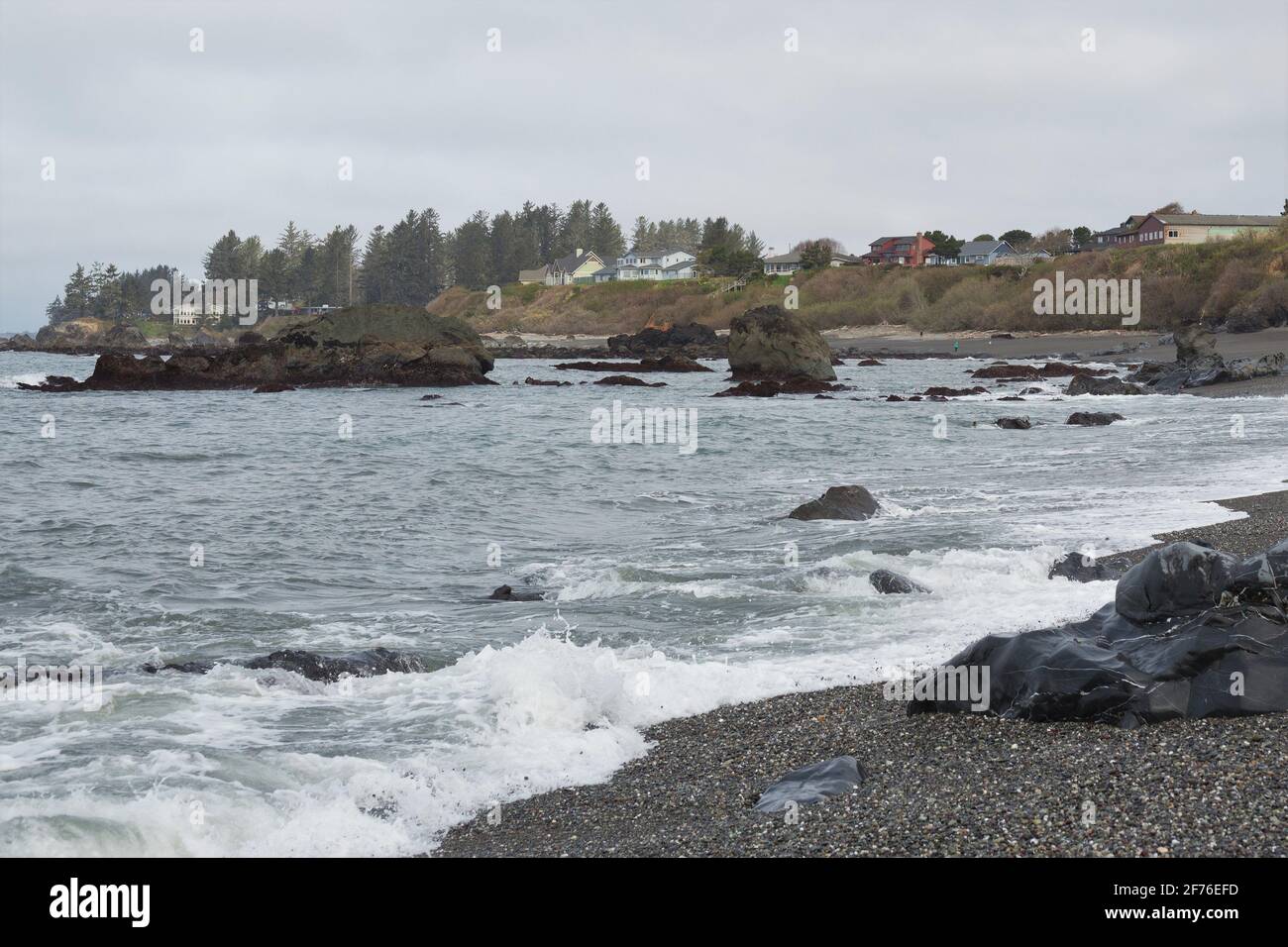 Houses along the shore at McVay Rock State Recreation Area in Brookings, Oregon. Stock Photo