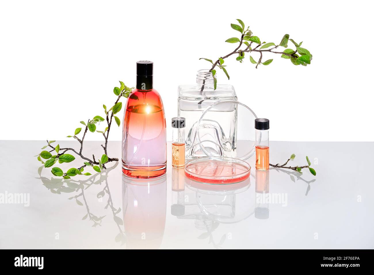 Natural Green laboratory. Abstract floral design. Orange liquid product