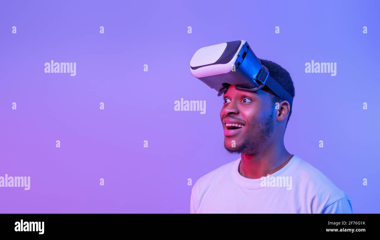 Black Man In VR Headset Experiencing Virtual Relity While Playing Video ...