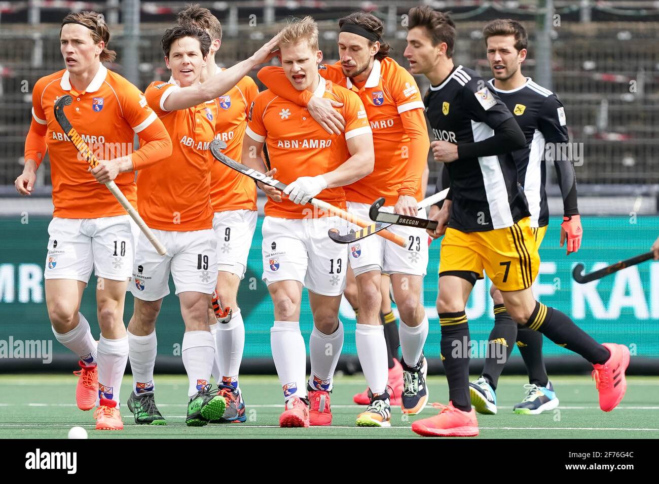 AMSTELVEEN, NETHERLANDS - APRIL 5: Wouter Jolie of Bloemendaal, Jasper Brinkman of Bloemendaal and Florian Fuchs of Bloemendaal celabrate their teams first goal during the Euro Hockey League Final match between Atletic Terrassa HC and Bloemendaal at Wagener Stadion on April 5, 2021 in Amstelveen, Netherlands (Photo by Andre Weening/Orange Pictures) Stock Photo