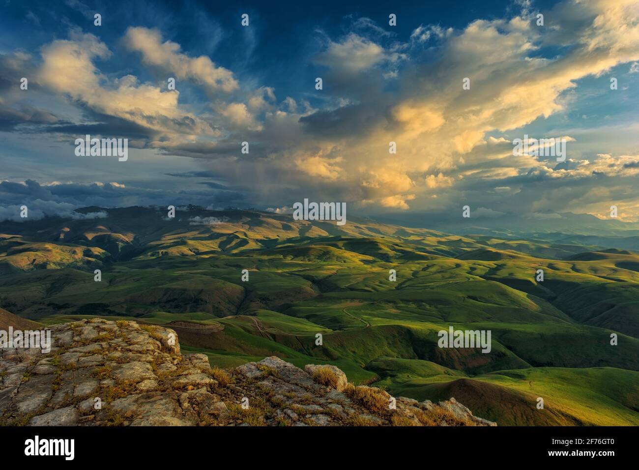 Sunset on hills in Caucasus mountains Stock Photo