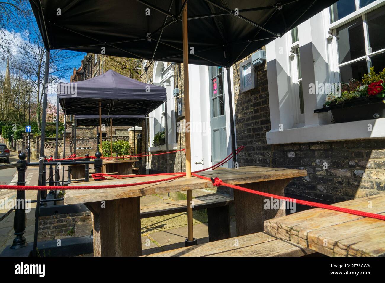 The Wells Tavern pub beer garden roped off and ready for customers when