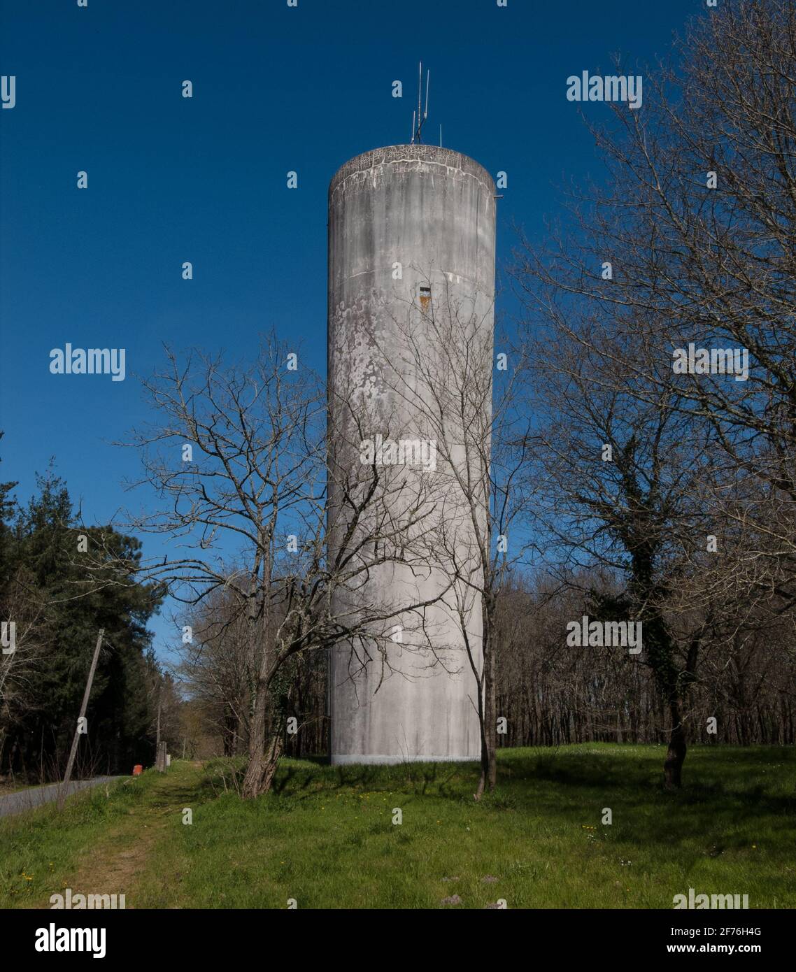 WATER TOWER IN THE COUNTRY SIDE - WATER RESERVOIR - CHATEAU D'EAU - AQUITAINE FRANCE © Frédéric BEAUMONT Stock Photo