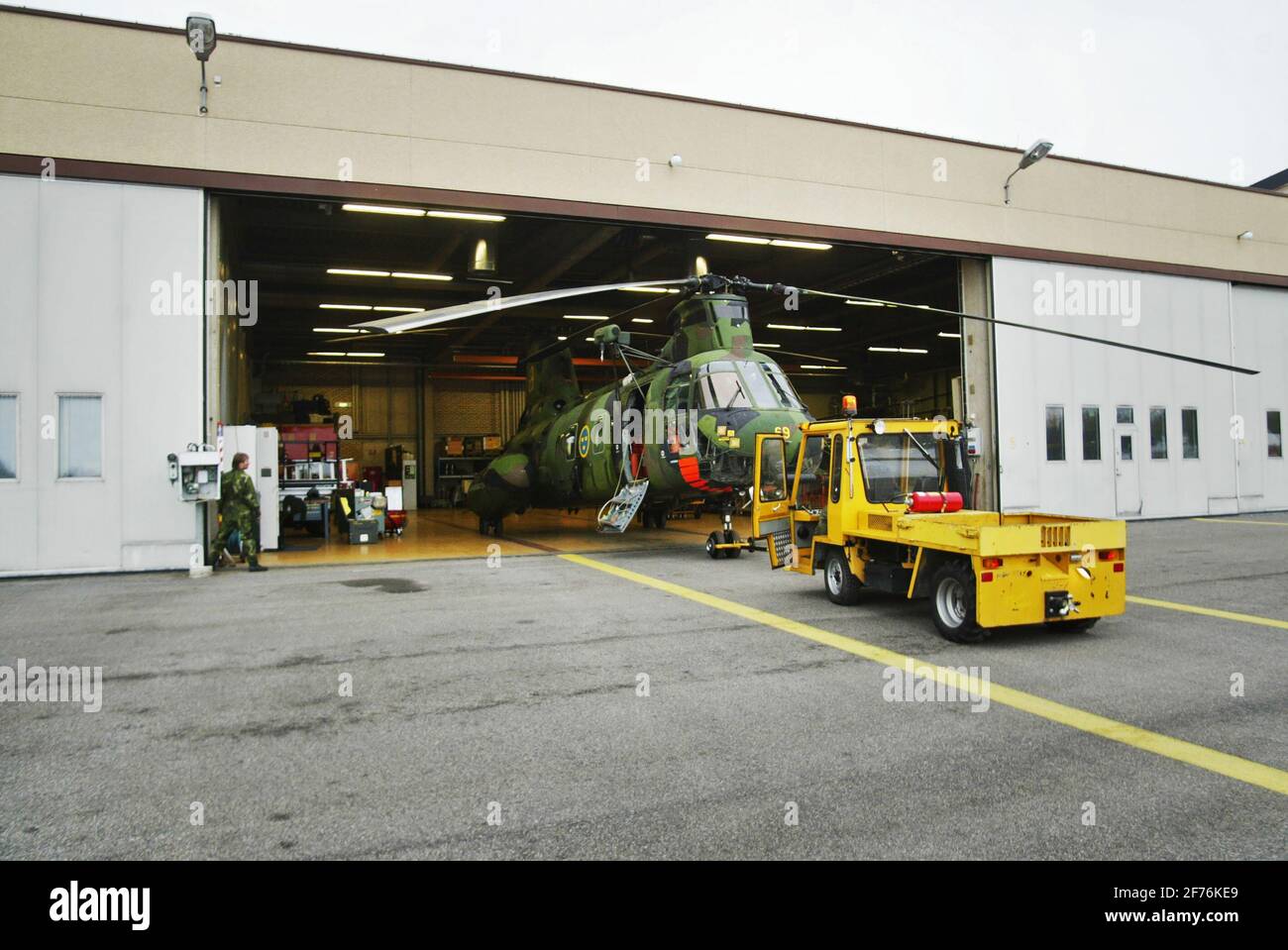 The Swedish Air Force's Helicopter 4, Hkp 4, Boeing Vertol 107, is rolled out of the hangar at Berga naval base. Hkp 4 was used in submarine hunts and rescue missions such as the Estonia disaster. Stock Photo