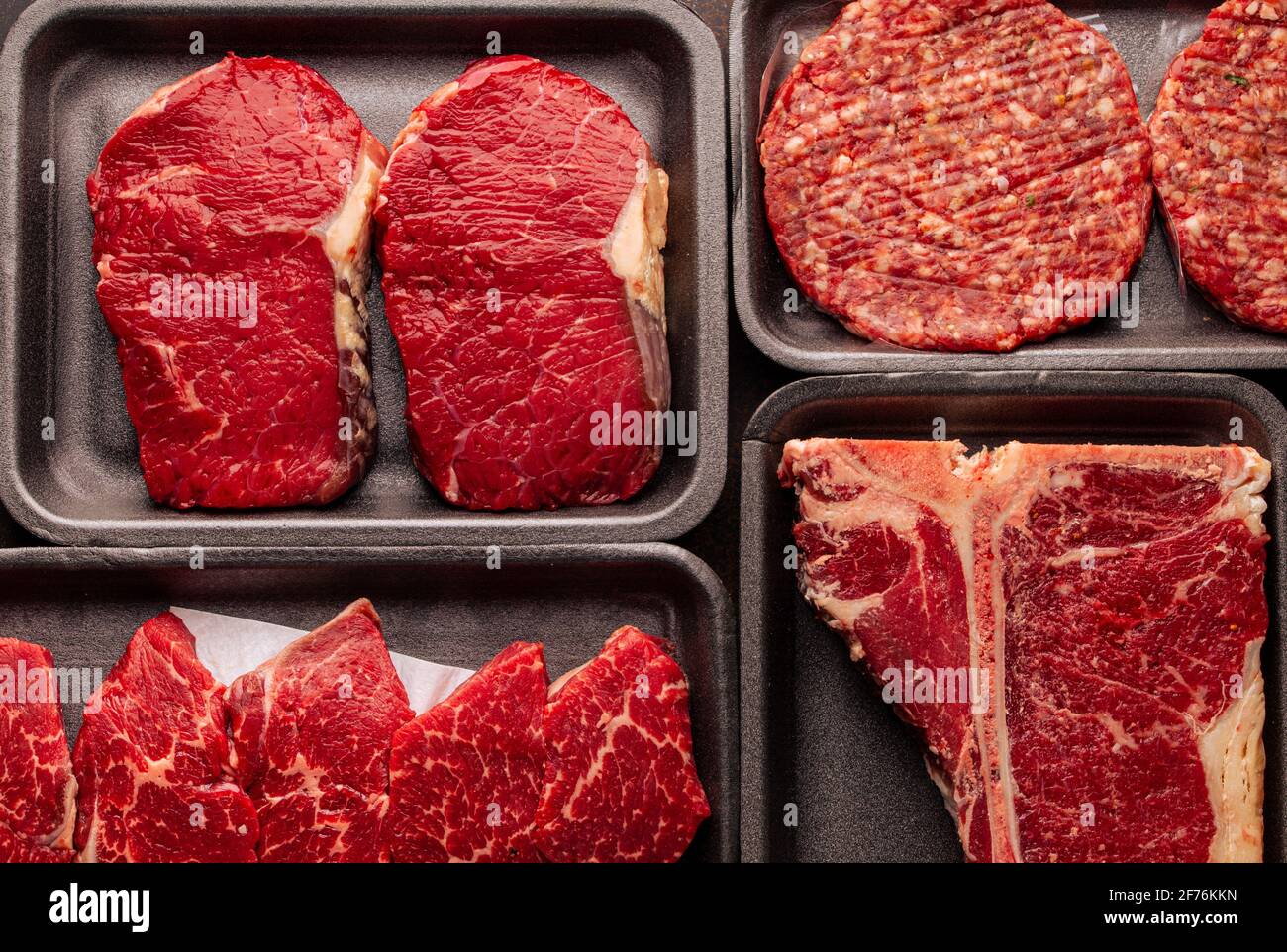 Assorted raw beef meat in plastic boxes Stock Photo Alamy