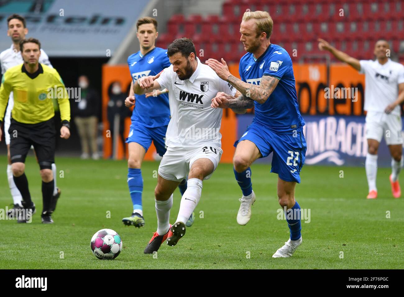 from right: Kevin VOGT (1899 Hoffenheim), action, duels versus Daniel  CALIGIURI (FC Augsburg). Soccer 1. Bundesliga season 2020/2021,  27.matchday, matchday27, FC Augsburg - TSG 1899 Hoffenheim 2-1 on  03.04.2021 WWK ARENA in Augsburg, | usage worldwide ...