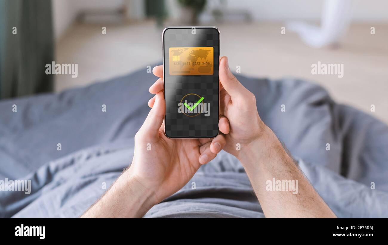 Unrecognizable Man Using Smartphone Payment Screen At Home Stock Photo