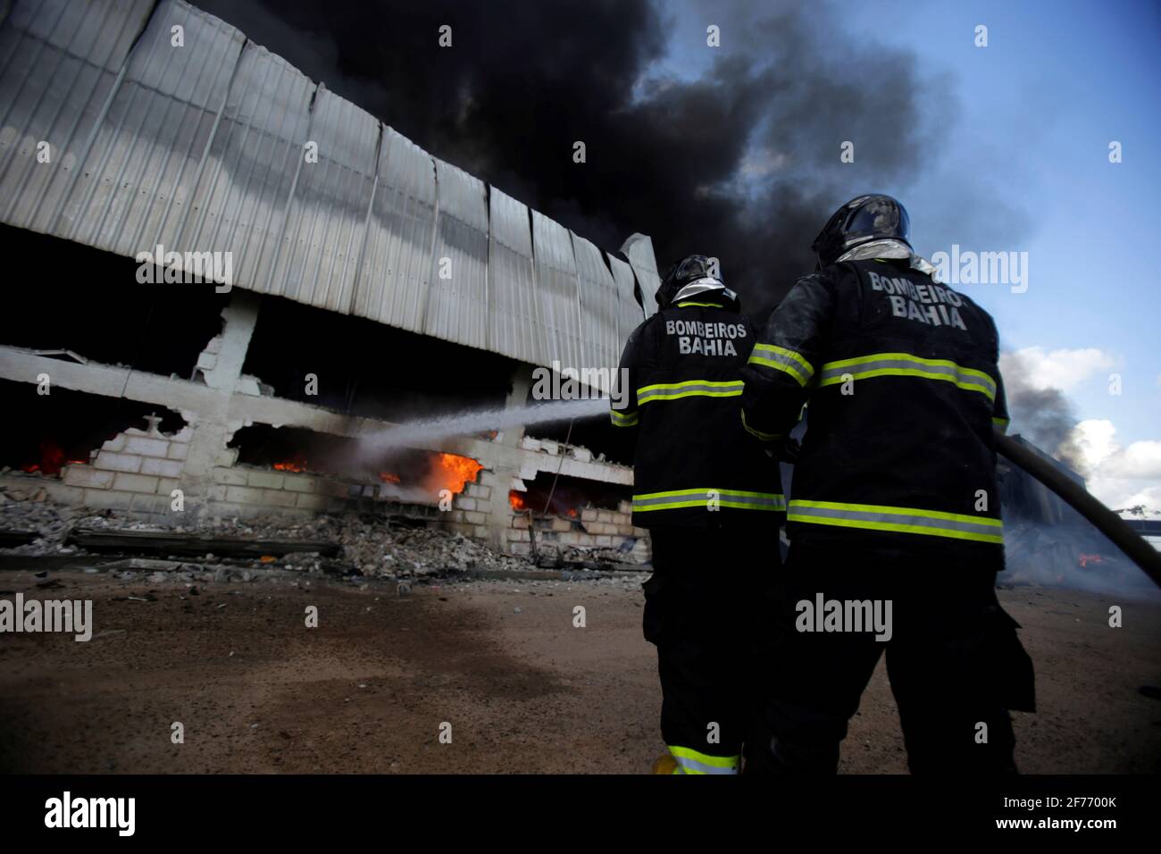 sao sebastiao do passe, bahia / brazil - may 31, 2019: Firefighters fire fighting at tire recycling factory in the city of Sao Sebastiao do Passe. *** Stock Photo