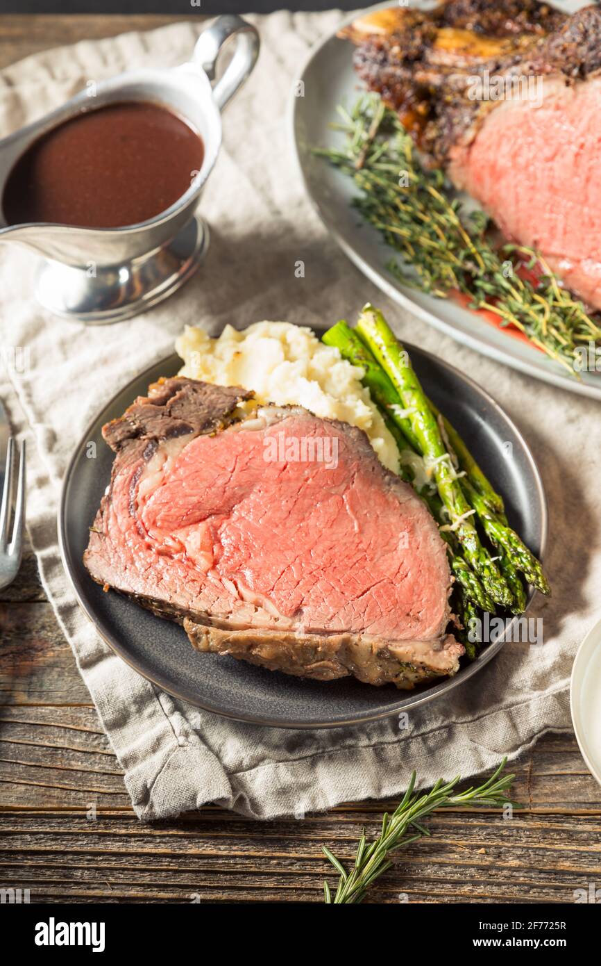 Homemade Prime Rib Beef Roast with Gravy and Herbs Stock Photo Alamy