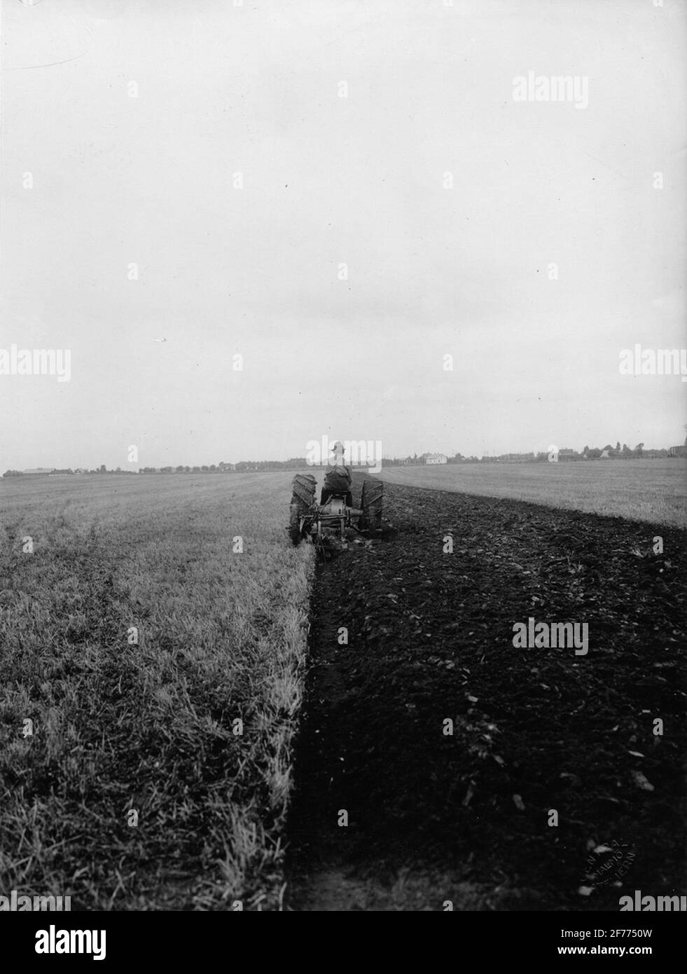 Vehicle tractor with plow Stock Photo - Alamy