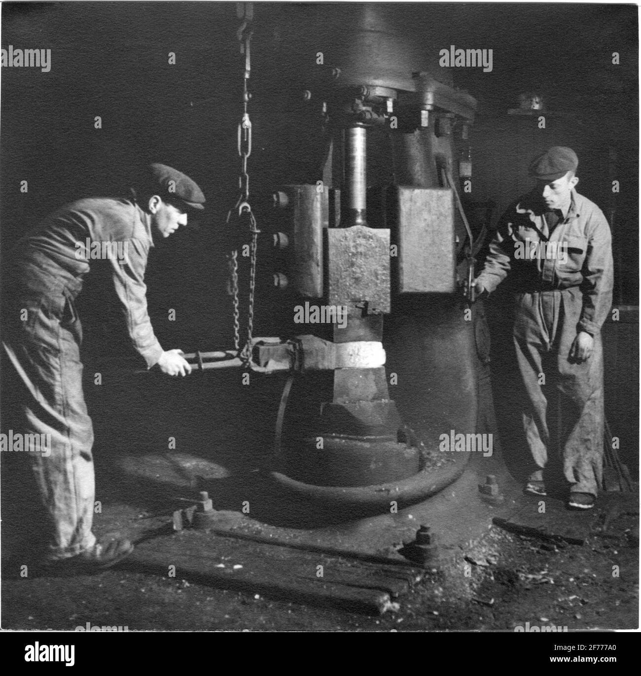 Steam hammer on unknown ironworks. The photograph was included in Tefas prize competition in 1941. Stock Photo
