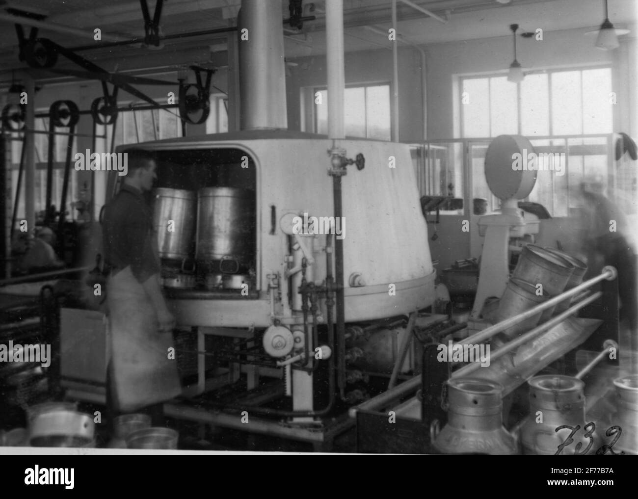 Transport path at unknown dairy, manufactured by the workshop share company mechano in Hälsingborg. Stock Photo