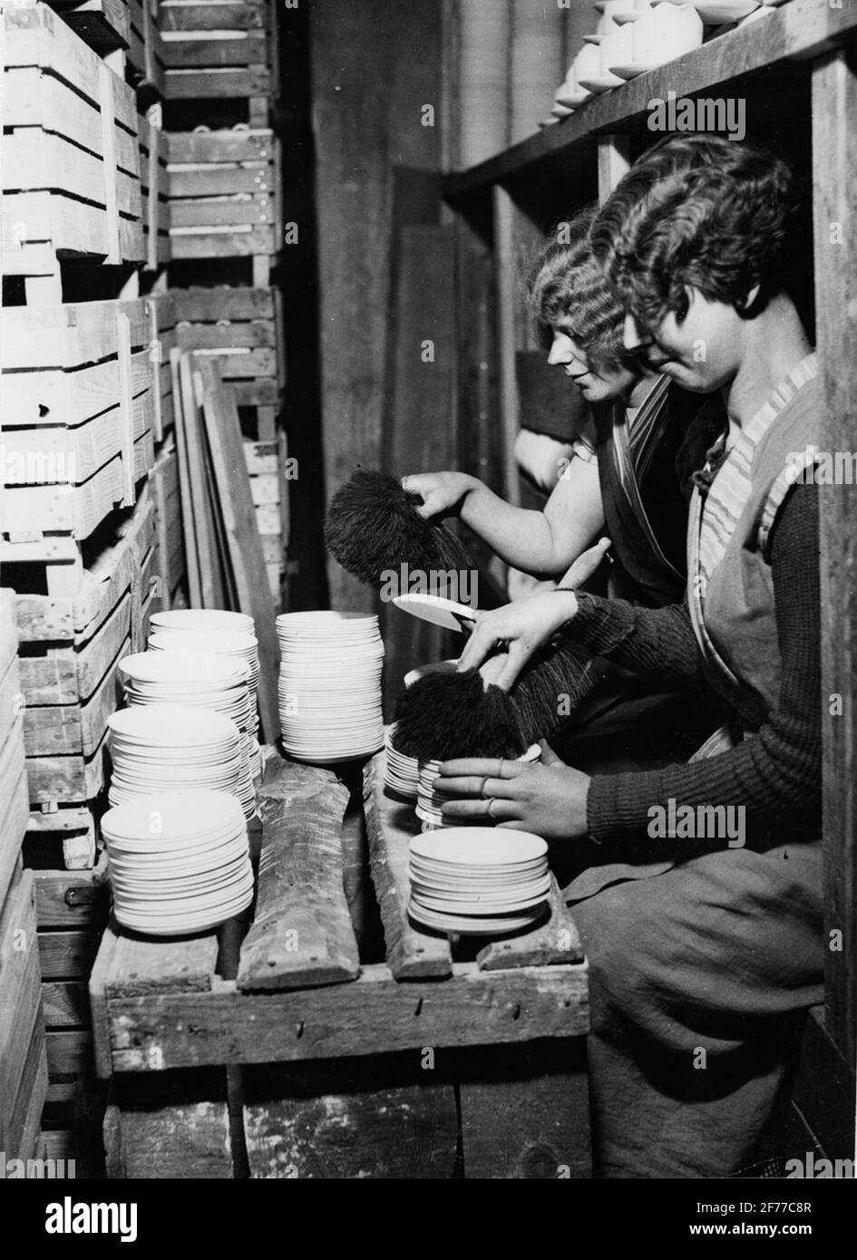 Gustavsberg's porcelain factory. Porcelain workers pouching barrels Stock Photo Alamy