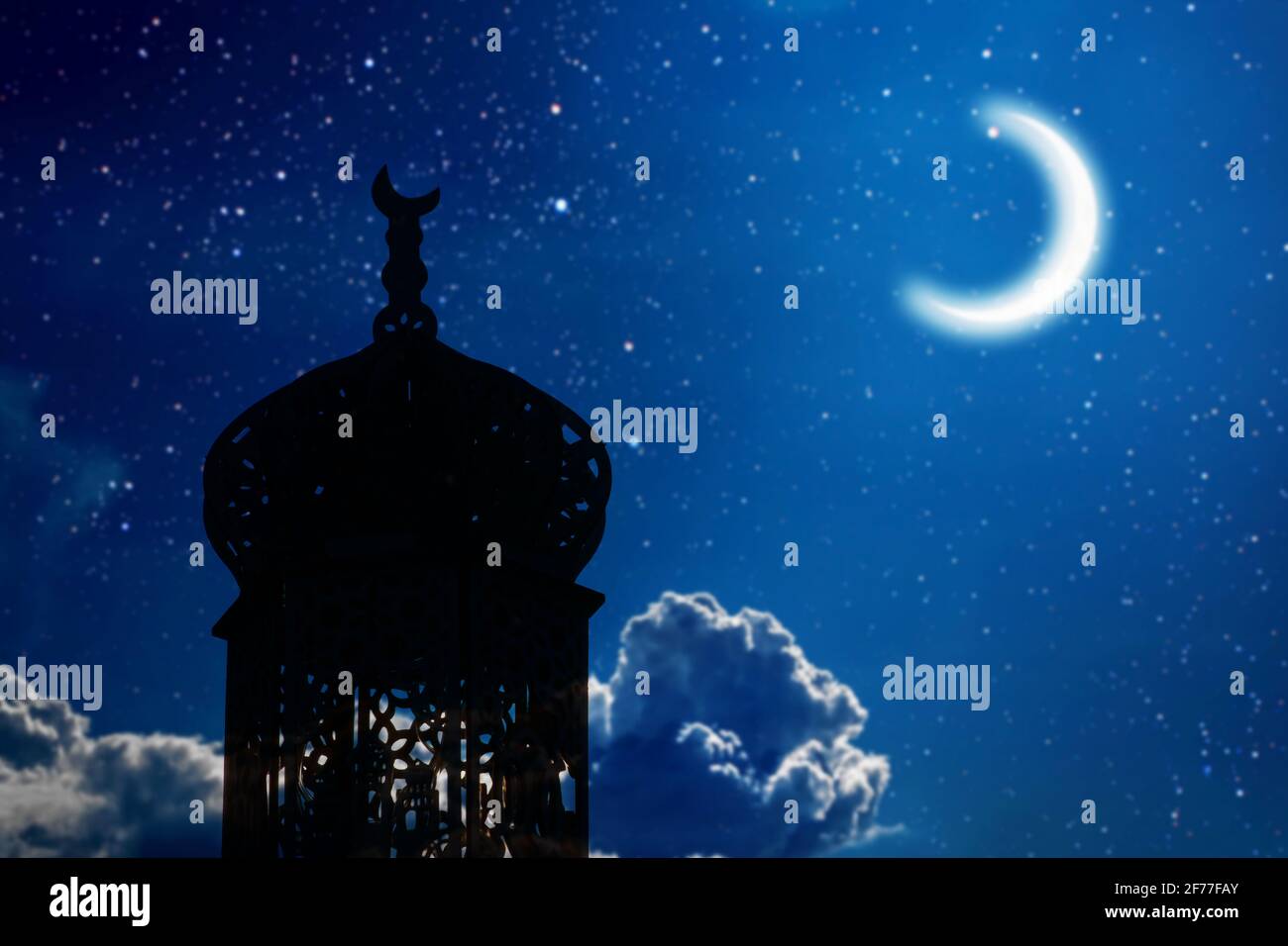 Ramadan Kareem background. Mosque silhouette in night sky with crescent ...